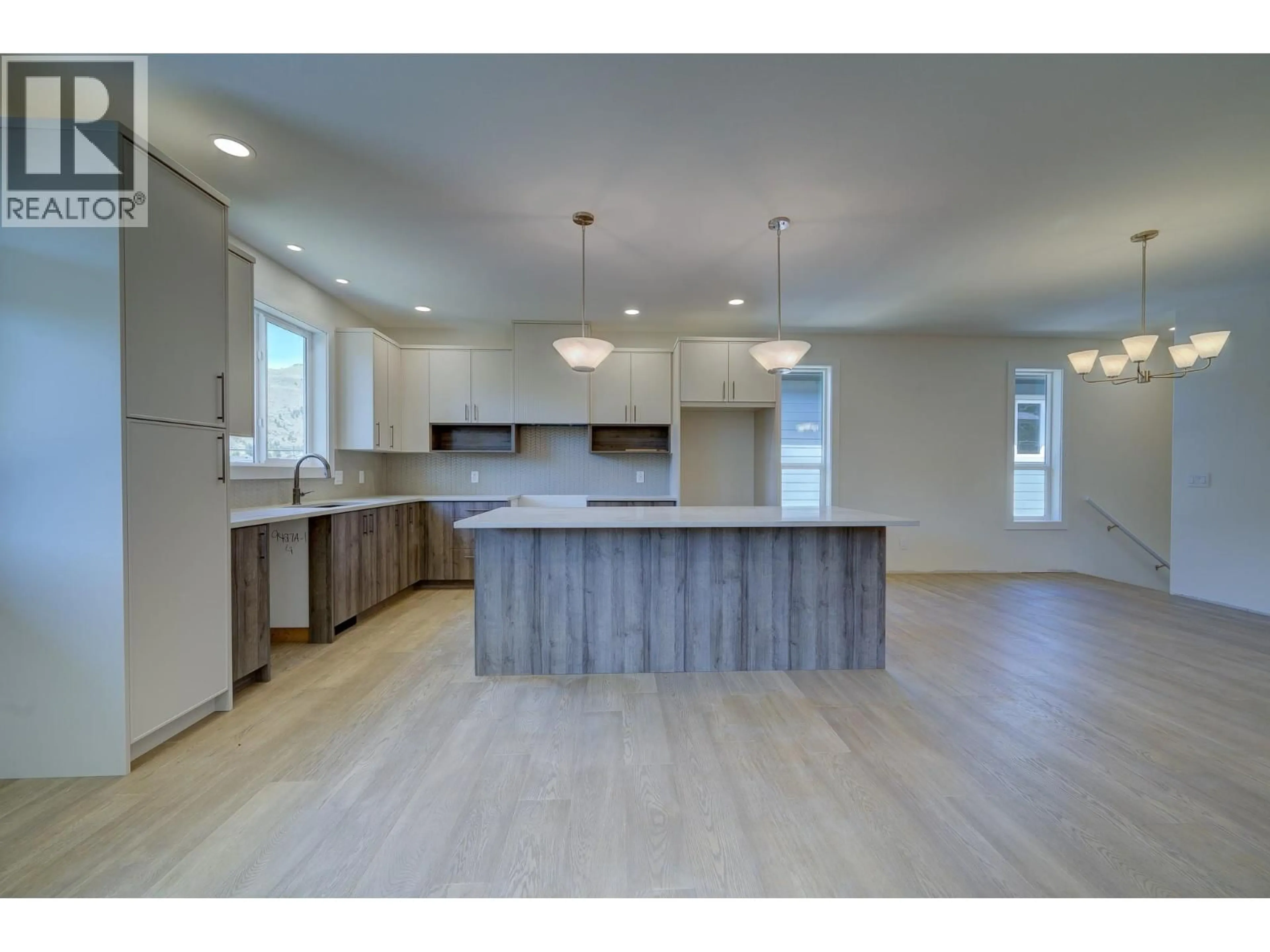 Open concept kitchen, wood/laminate floor for 3224 BANK ROAD, Kamloops British Columbia V2B6Z7