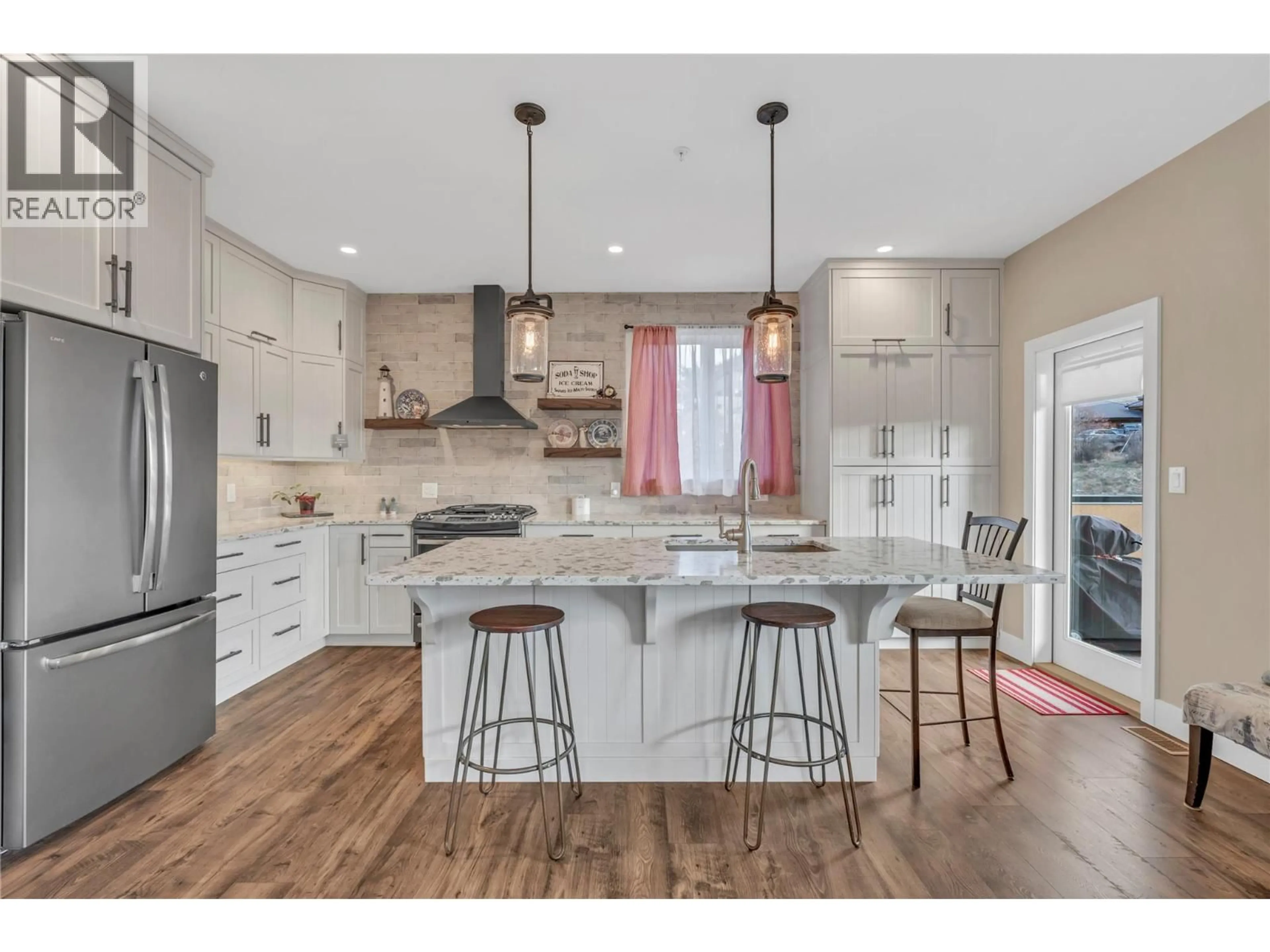 Open concept kitchen, wood/laminate floor for 3 - 6709 VICTORIA ROAD, Summerland British Columbia V0H1Z2