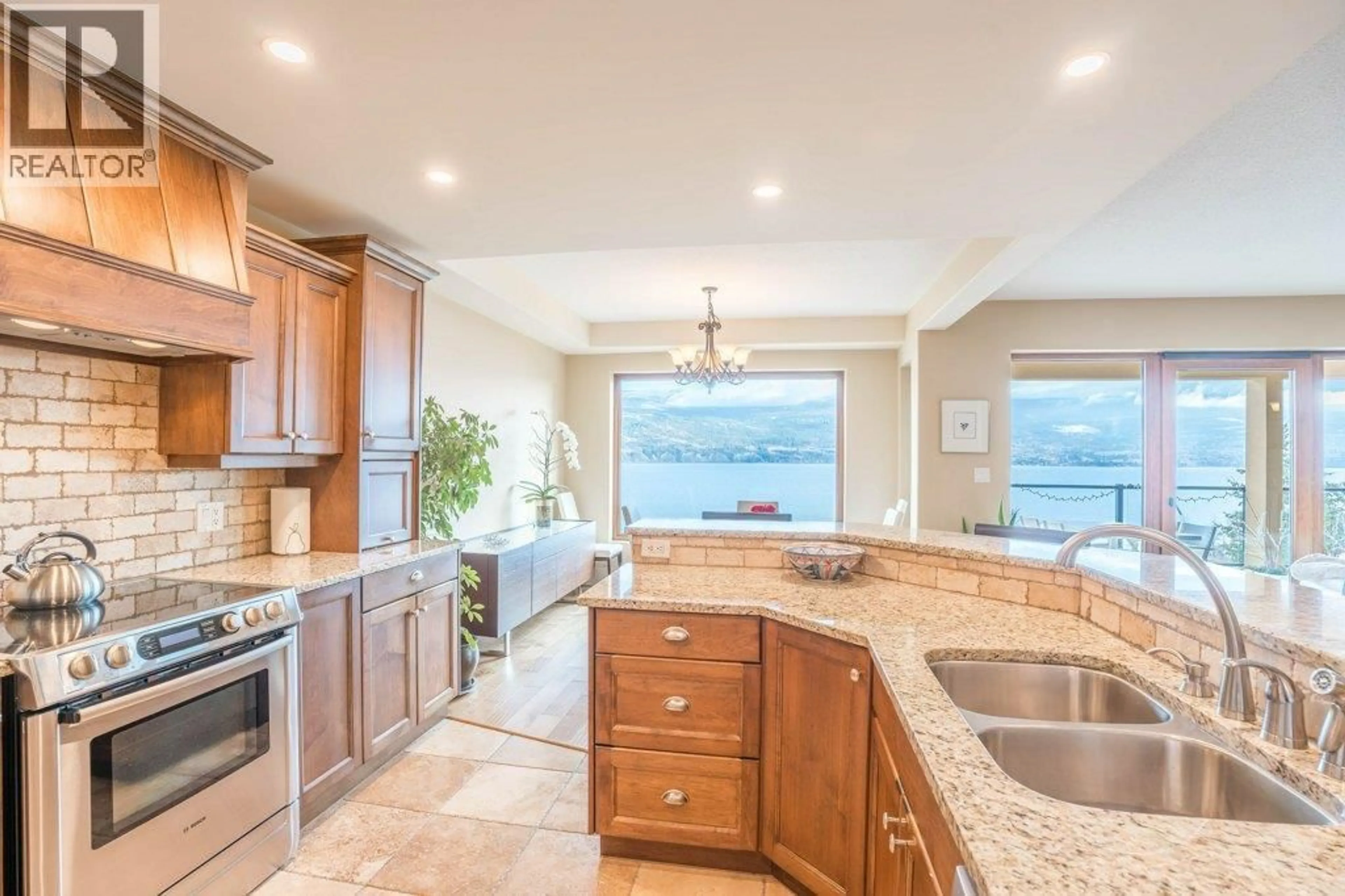 Open concept kitchen, ceramic/tile floor for 207 - 14419 DOWNTON AVENUE, Summerland British Columbia V0H1Z1