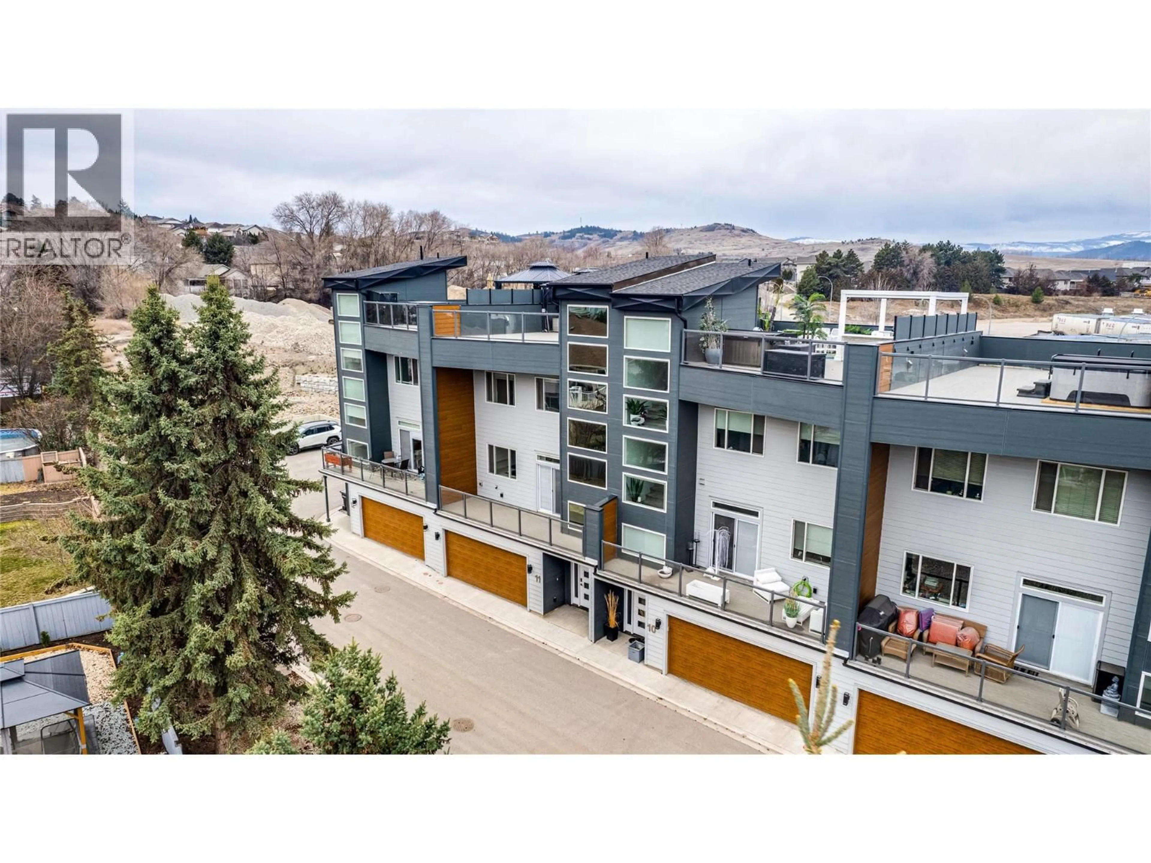 A pic from outside/outdoor area/front of a property/back of a property/a pic from drone, mountain view for 11 - 1039 MT. FOSTHALL DRIVE, Vernon British Columbia V1B2W2