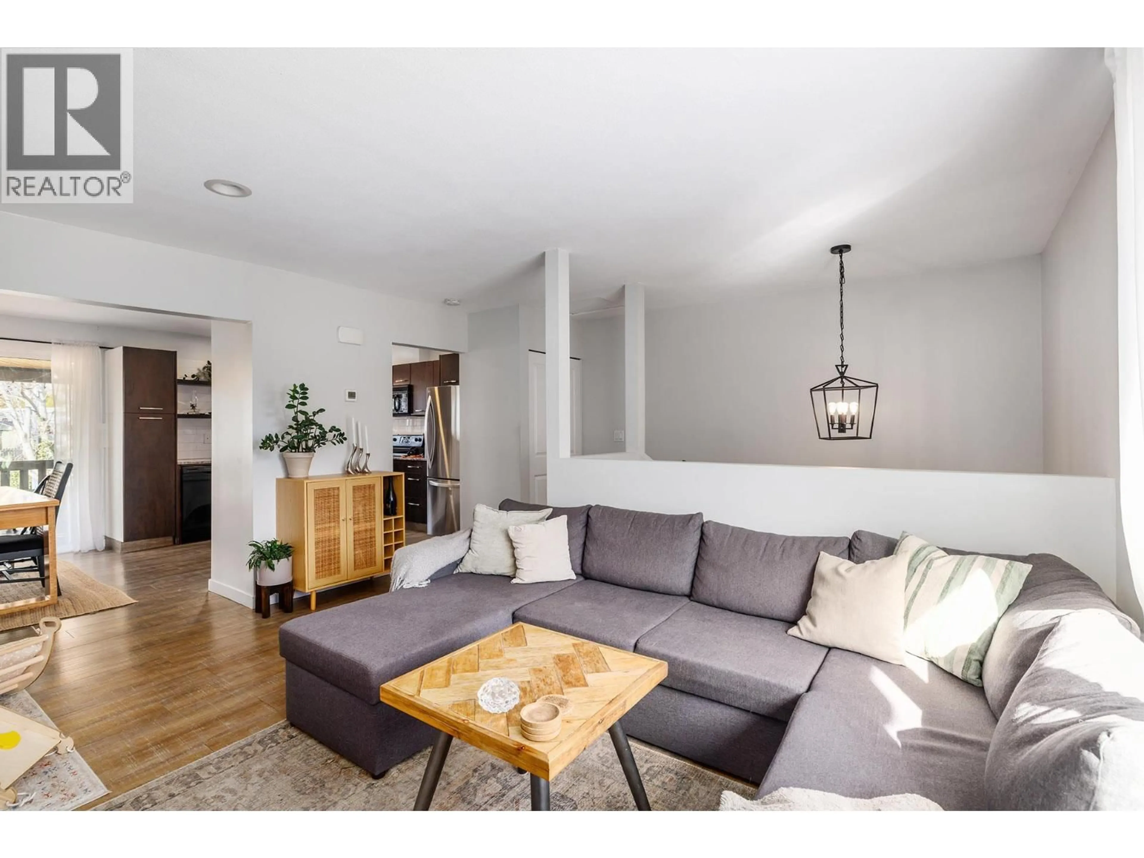 Living room with furniture, wood/laminate floor for 2728 RIFFINGTON PLACE, West Kelowna British Columbia V1Z3L1