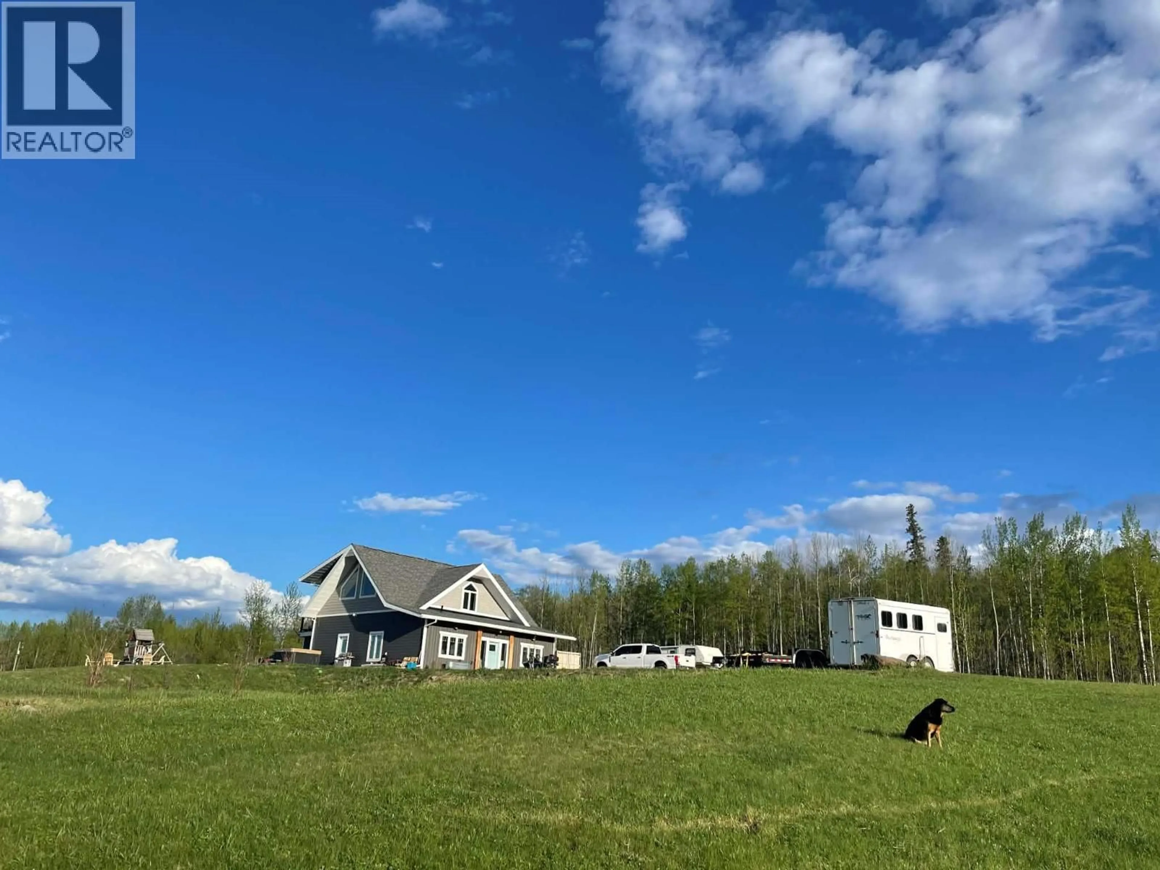 A pic from outside/outdoor area/front of a property/back of a property/a pic from drone, mountain view for 610 COWIE CREEK ROAD, Chetwynd British Columbia V0C1J0