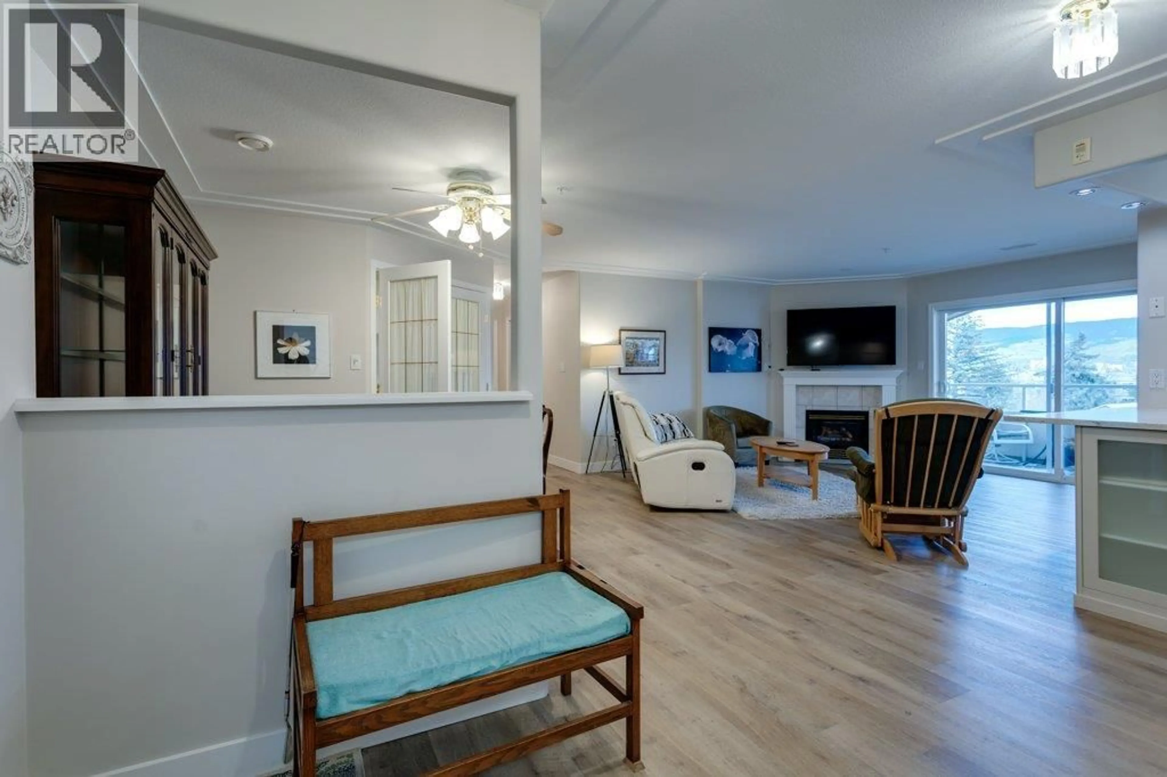 Living room with furniture, unknown for 404 - 1895 AMBROSI ROAD, Kelowna British Columbia V1Y4R8