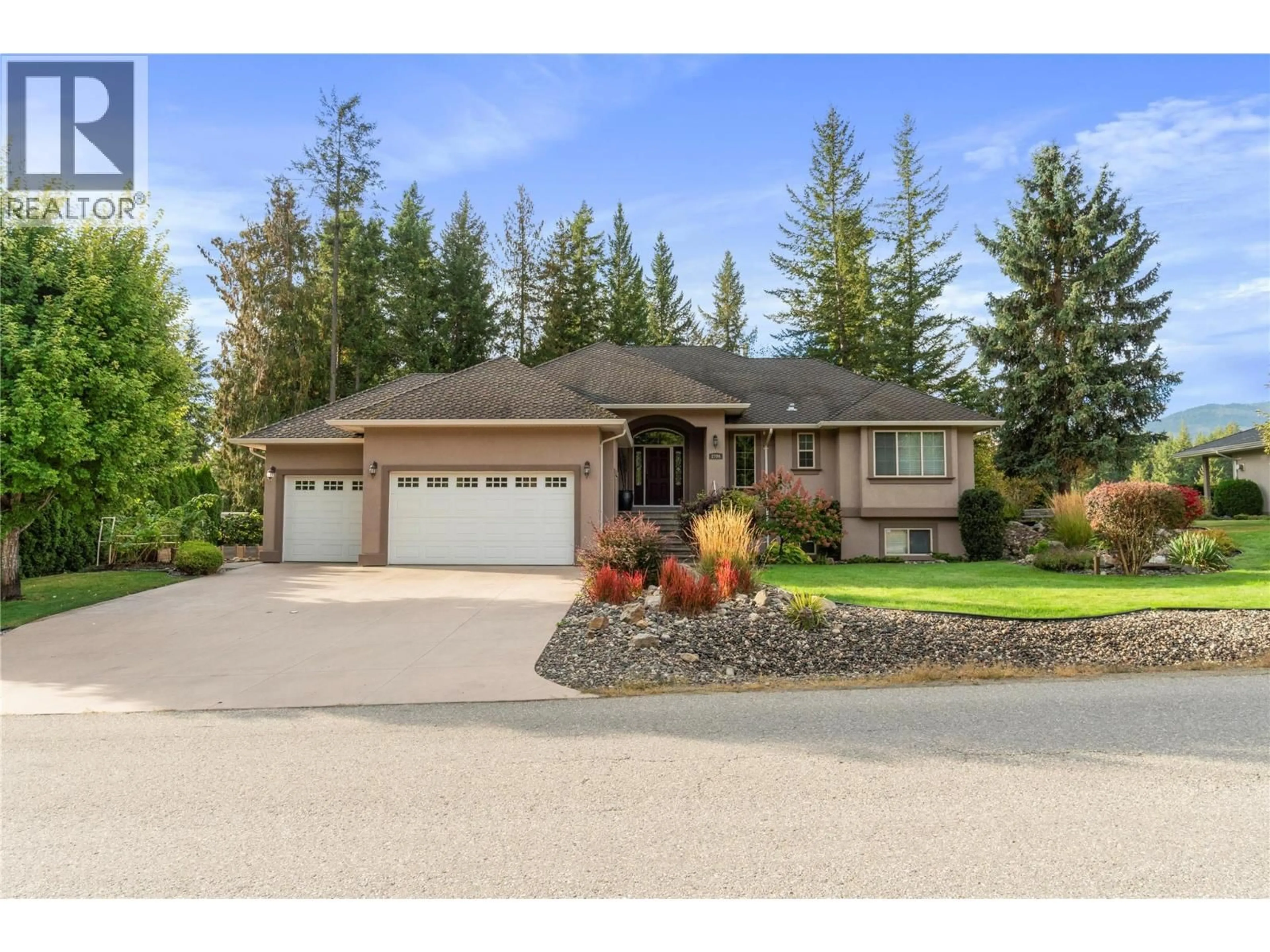 Home with vinyl exterior material, street for 2706 GOLF COURSE DRIVE, Blind Bay British Columbia V0E1H2