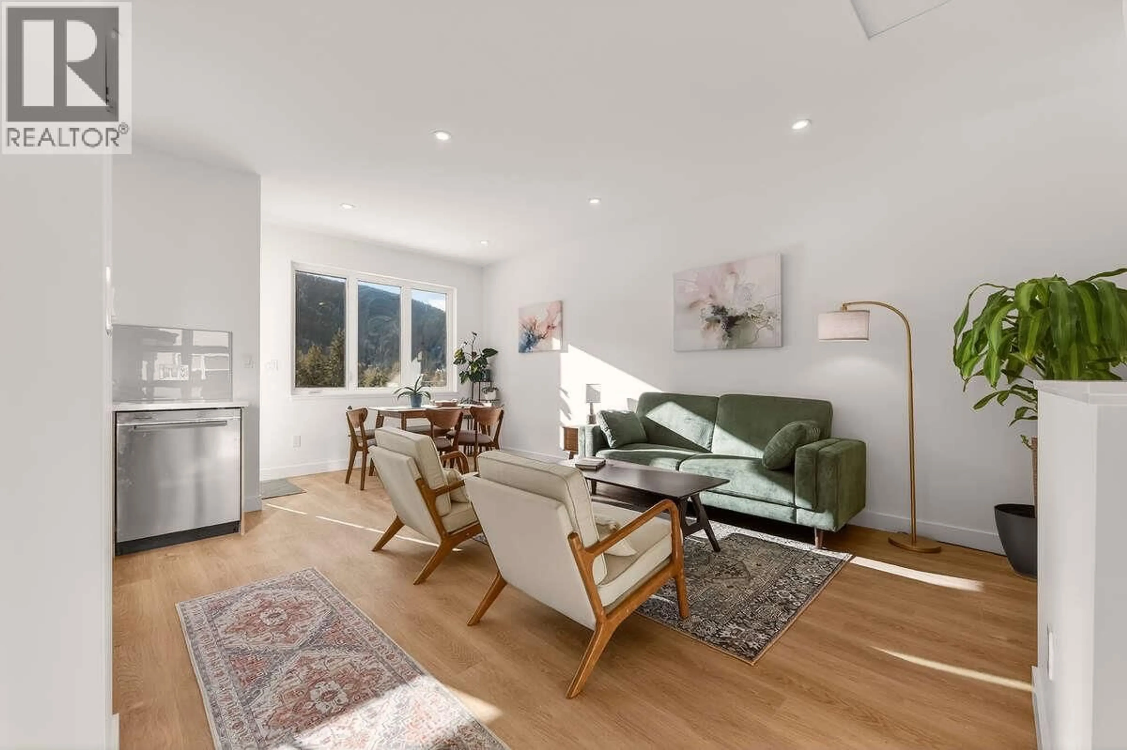 Living room with furniture, wood/laminate floor for B - 2224 FALLS STREET, Nelson British Columbia V1L1K4