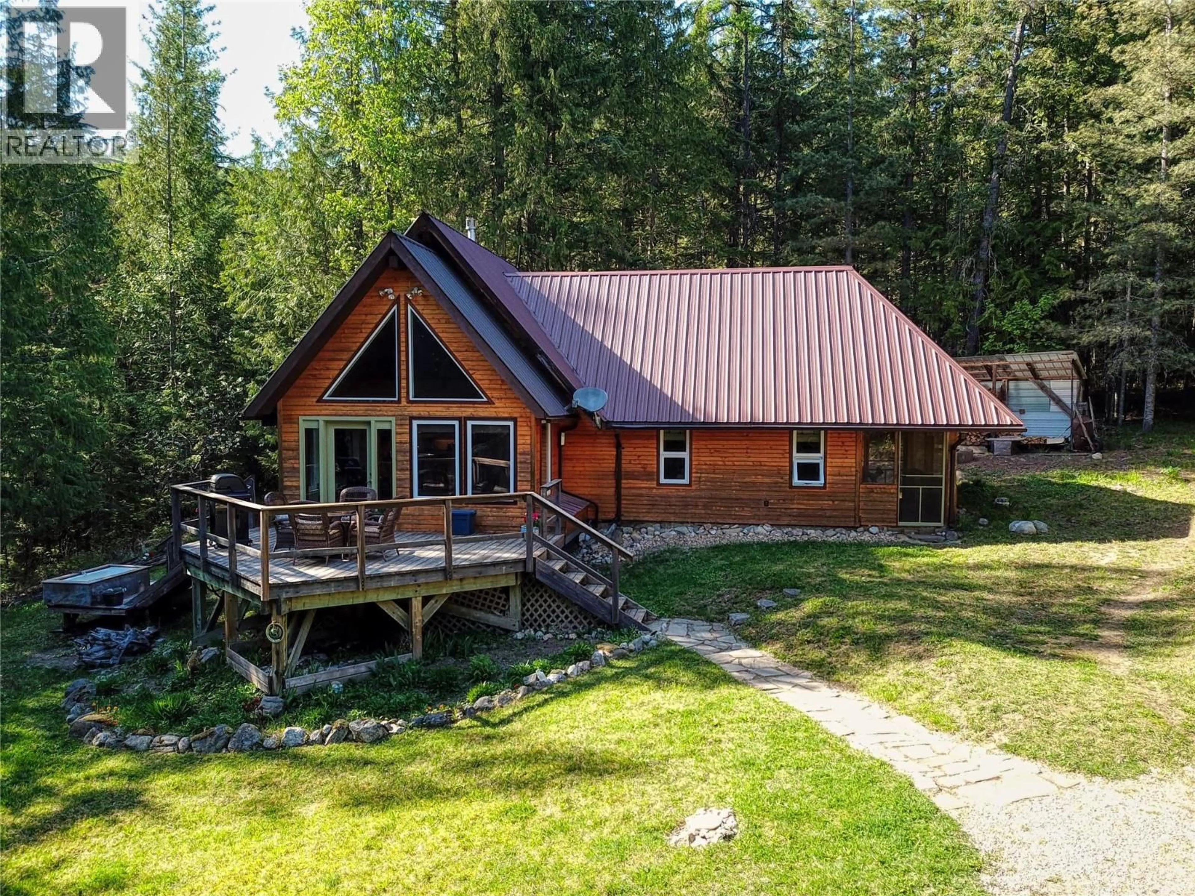 A pic from outside/outdoor area/front of a property/back of a property/a pic from drone, unknown for 16317 CEDAR ROAD, Crawford Bay British Columbia V0B1E0
