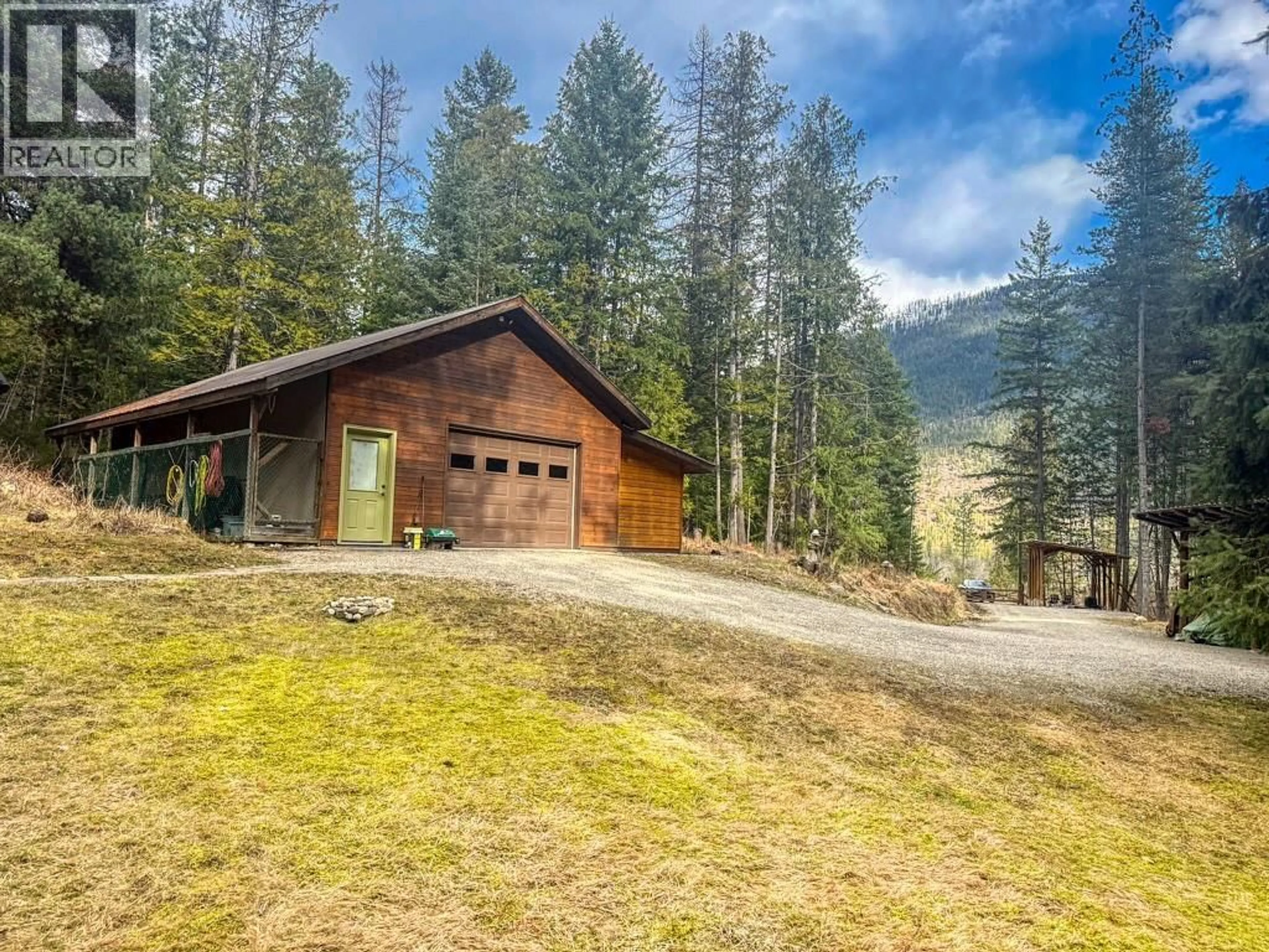 A pic from outside/outdoor area/front of a property/back of a property/a pic from drone, unknown for 16317 CEDAR ROAD, Crawford Bay British Columbia V0B1E0
