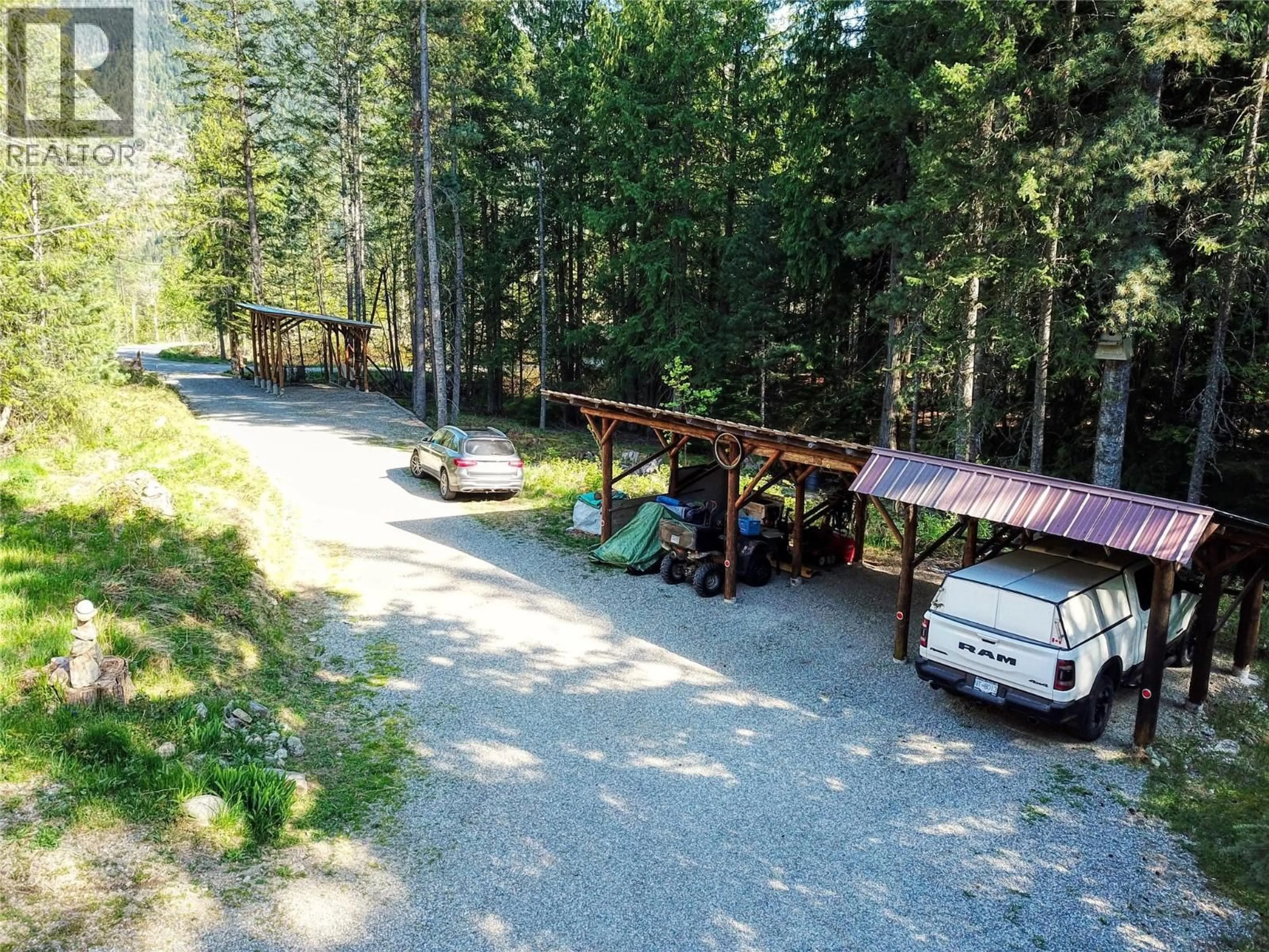A pic from outside/outdoor area/front of a property/back of a property/a pic from drone, forest/trees view for 16317 CEDAR ROAD, Crawford Bay British Columbia V0B1E0
