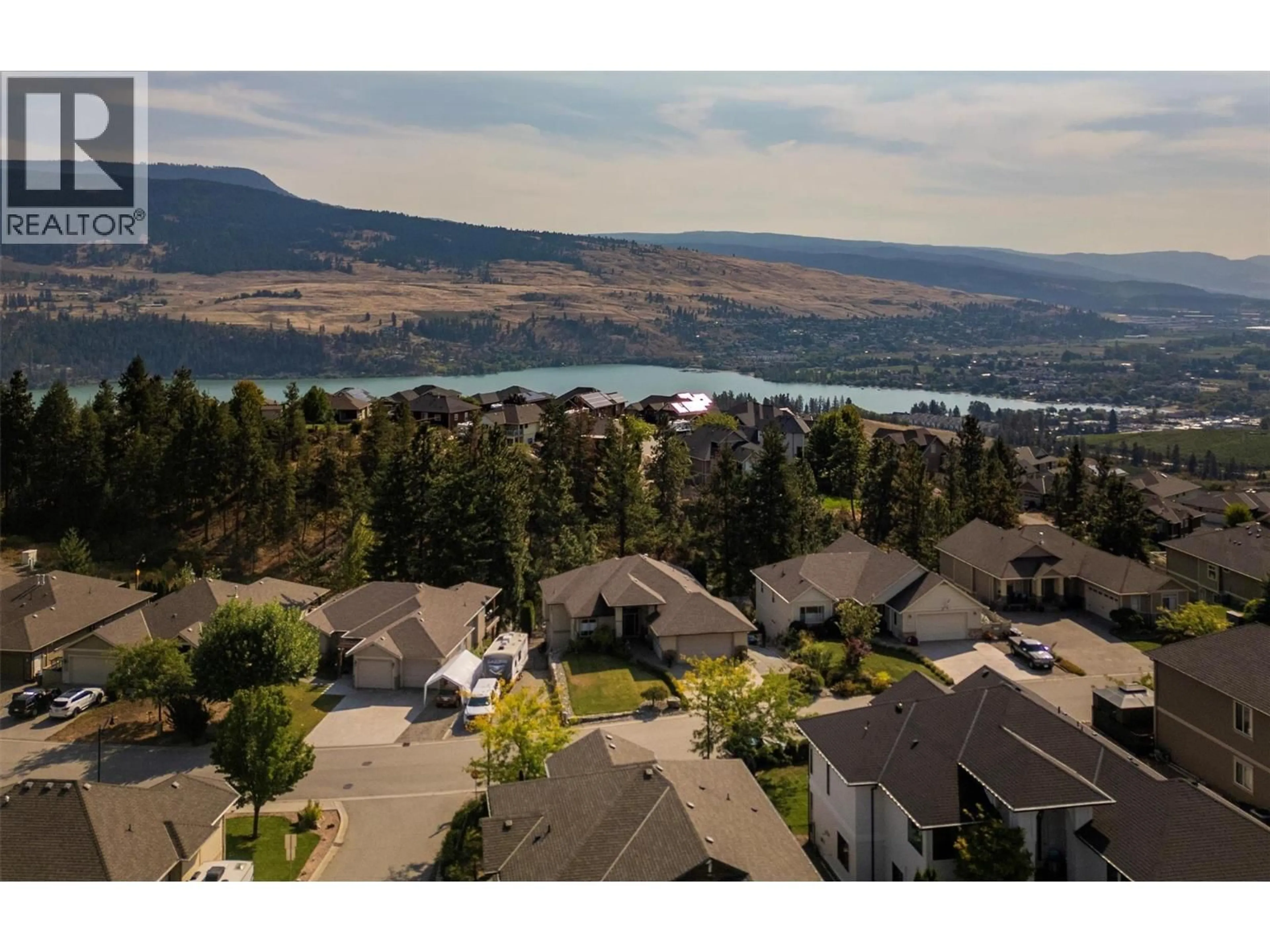 A pic from outside/outdoor area/front of a property/back of a property/a pic from drone, water/lake/river/ocean view for 12623 DRIFTWOOD COURT, Lake Country British Columbia V4V2M9
