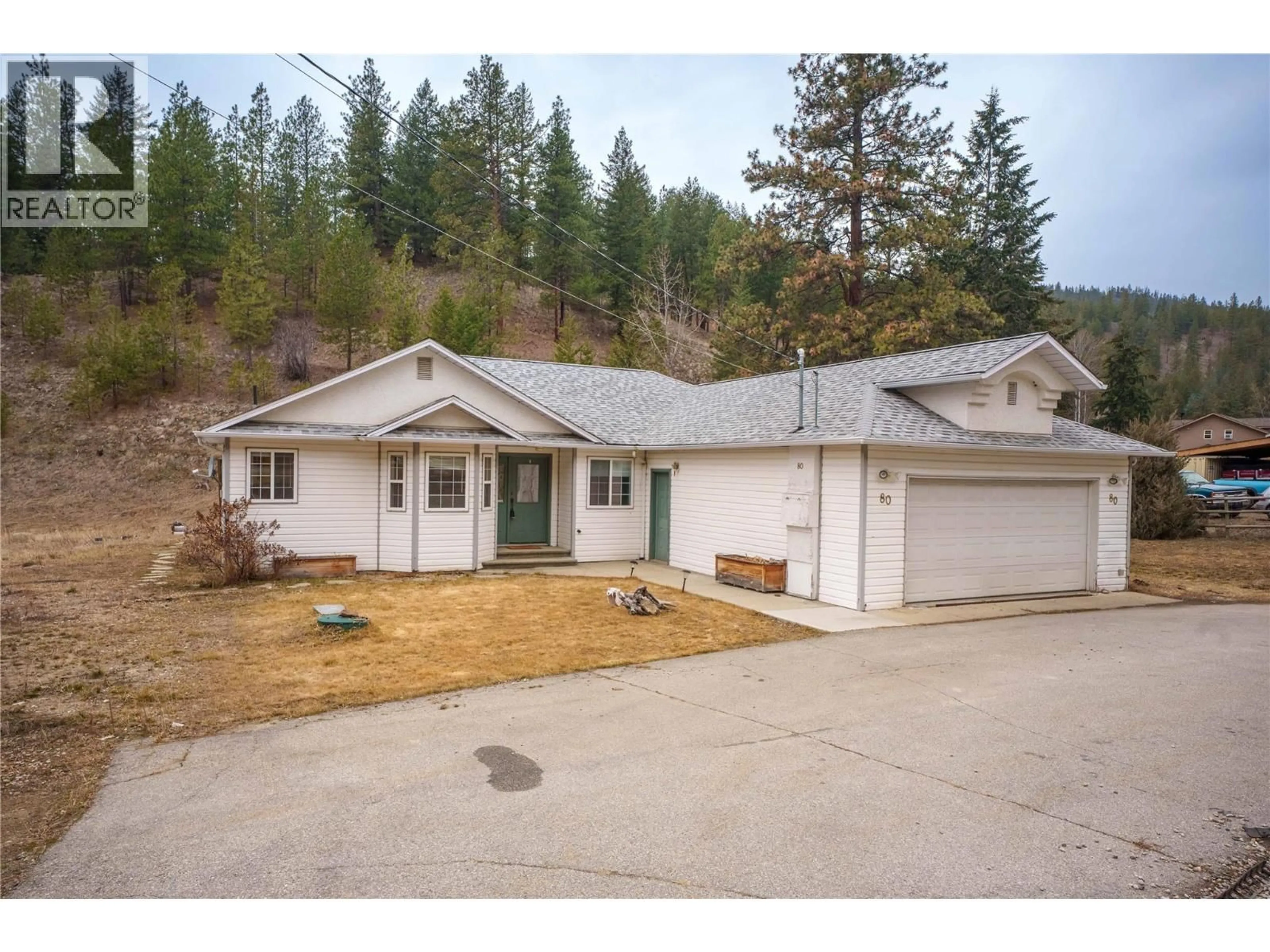 A pic from outside/outdoor area/front of a property/back of a property/a pic from drone, street for 80 FISH LAKE ROAD, Summerland British Columbia V0H1Z8