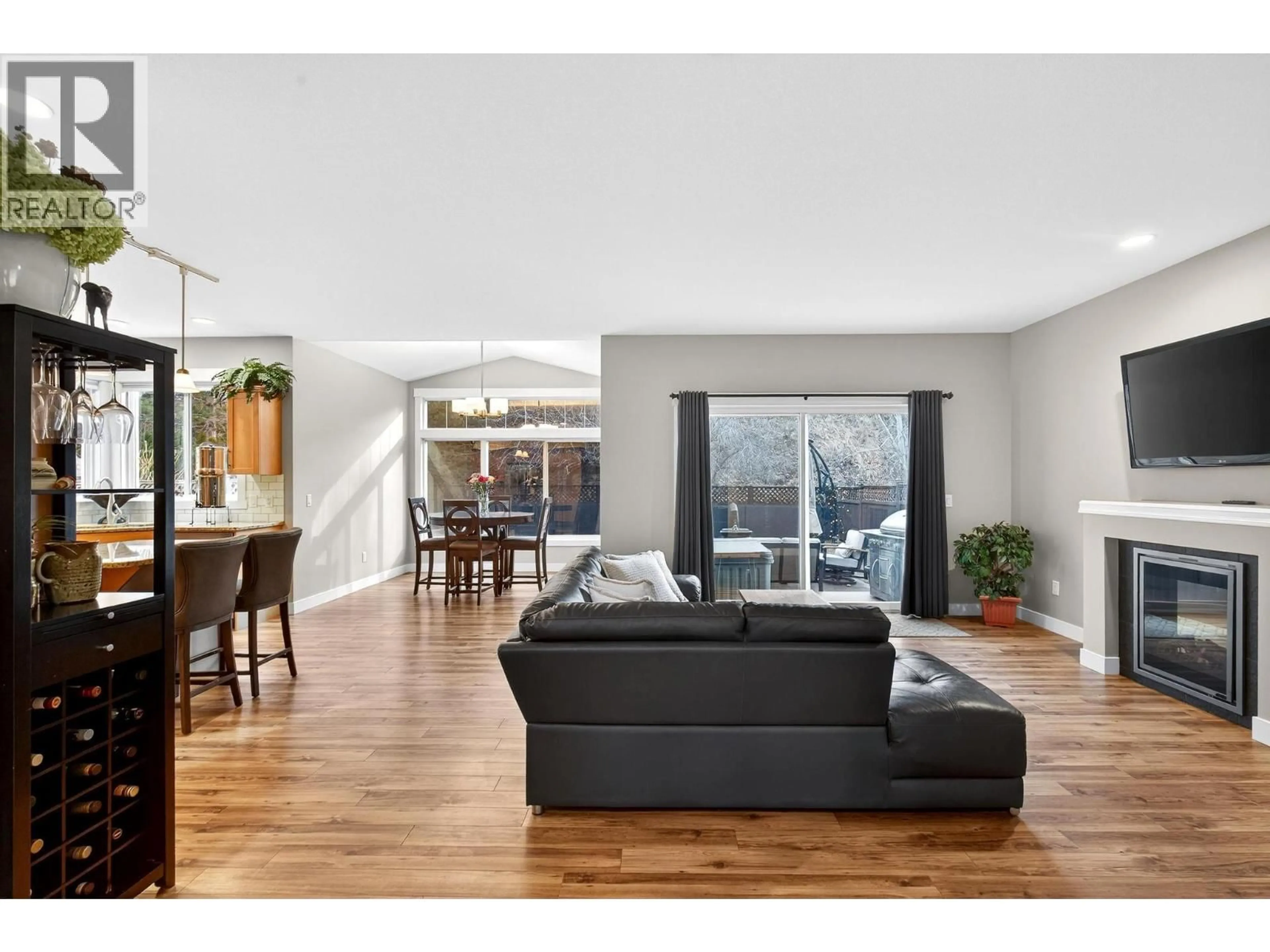 Living room with furniture, wood/laminate floor for 44 - 3293 BROADVIEW ROAD, West Kelowna British Columbia V4T3C8