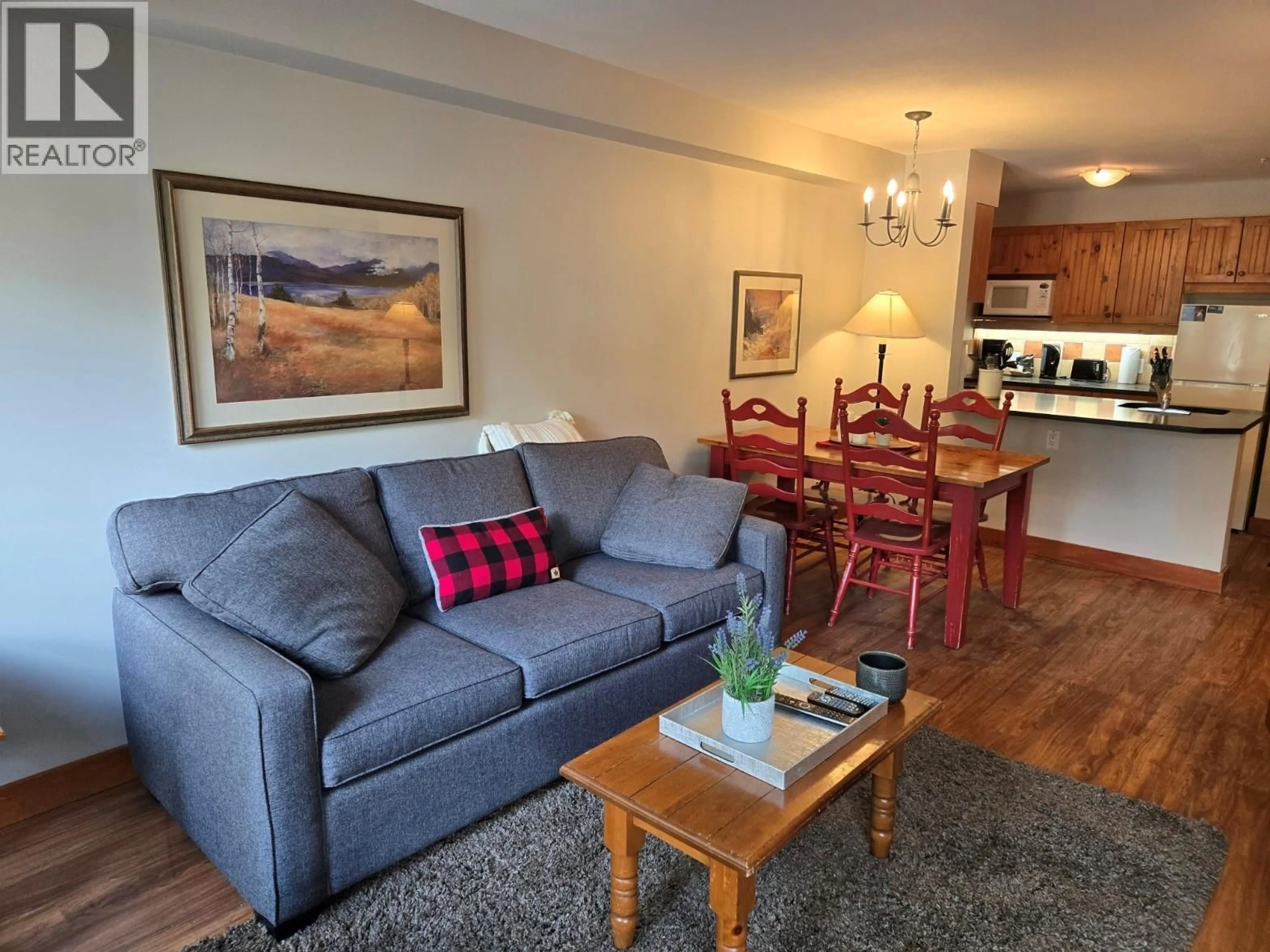 Living room with furniture, wood/laminate floor for 108 - 2080 SUMMIT DRIVE, Panorama British Columbia V0A1T0