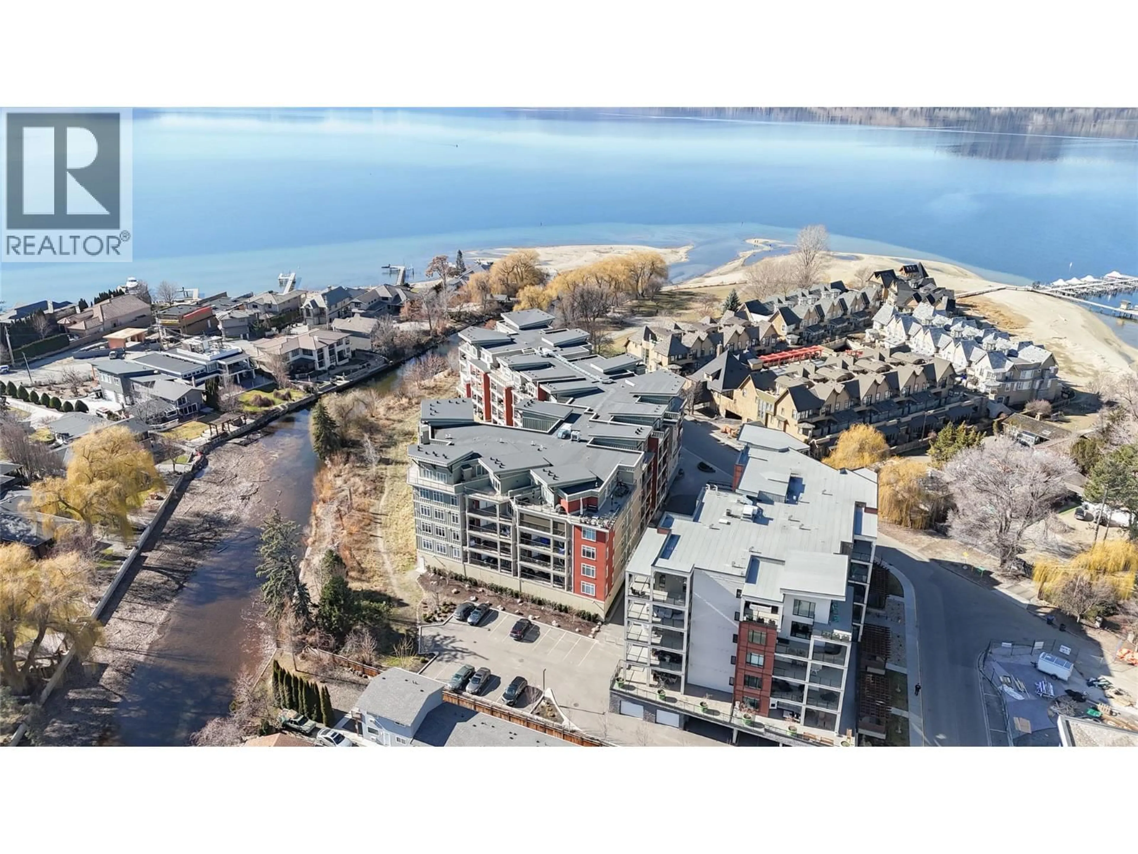 A pic from outside/outdoor area/front of a property/back of a property/a pic from drone, water/lake/river/ocean view for 604 - 529 TRUSWELL ROAD, Kelowna British Columbia V1W3K7