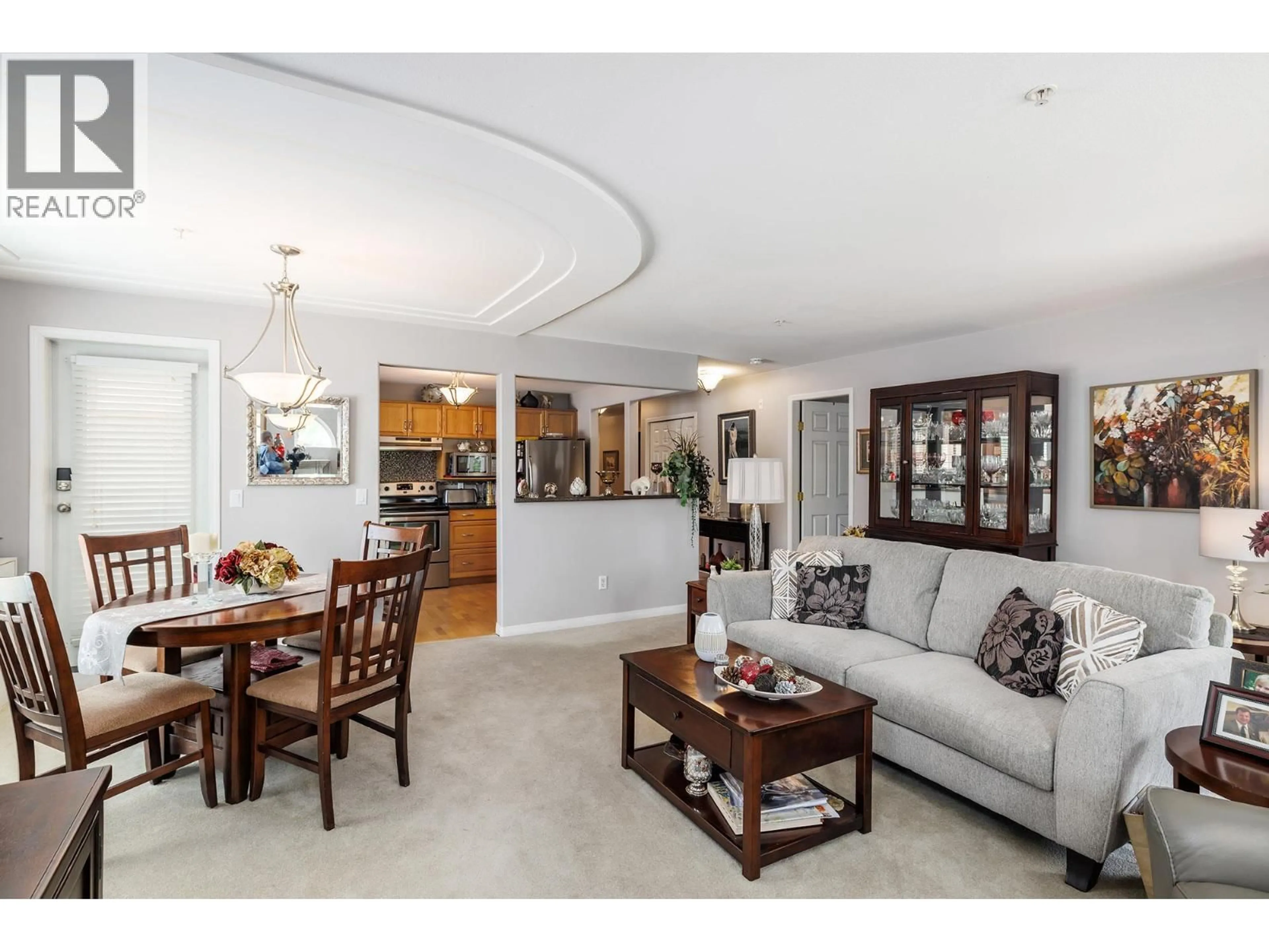 Living room with furniture, ceramic/tile floor for 108 - 2130 VASILE ROAD, Kelowna British Columbia V1Y6H5