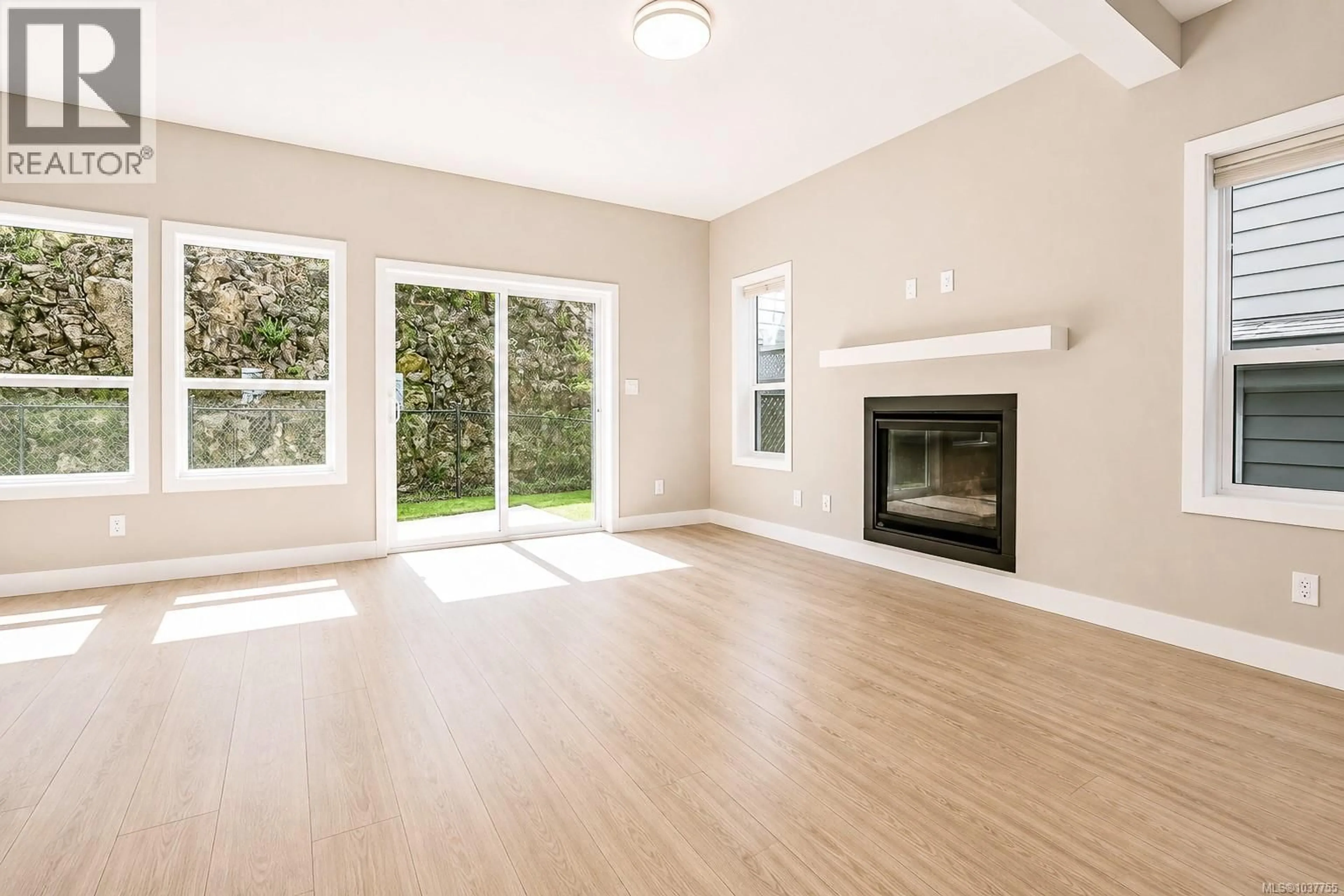 Living room with furniture, wood/laminate floor for 3496 MYLES MANSELL ROAD, Langford British Columbia V9C0N6
