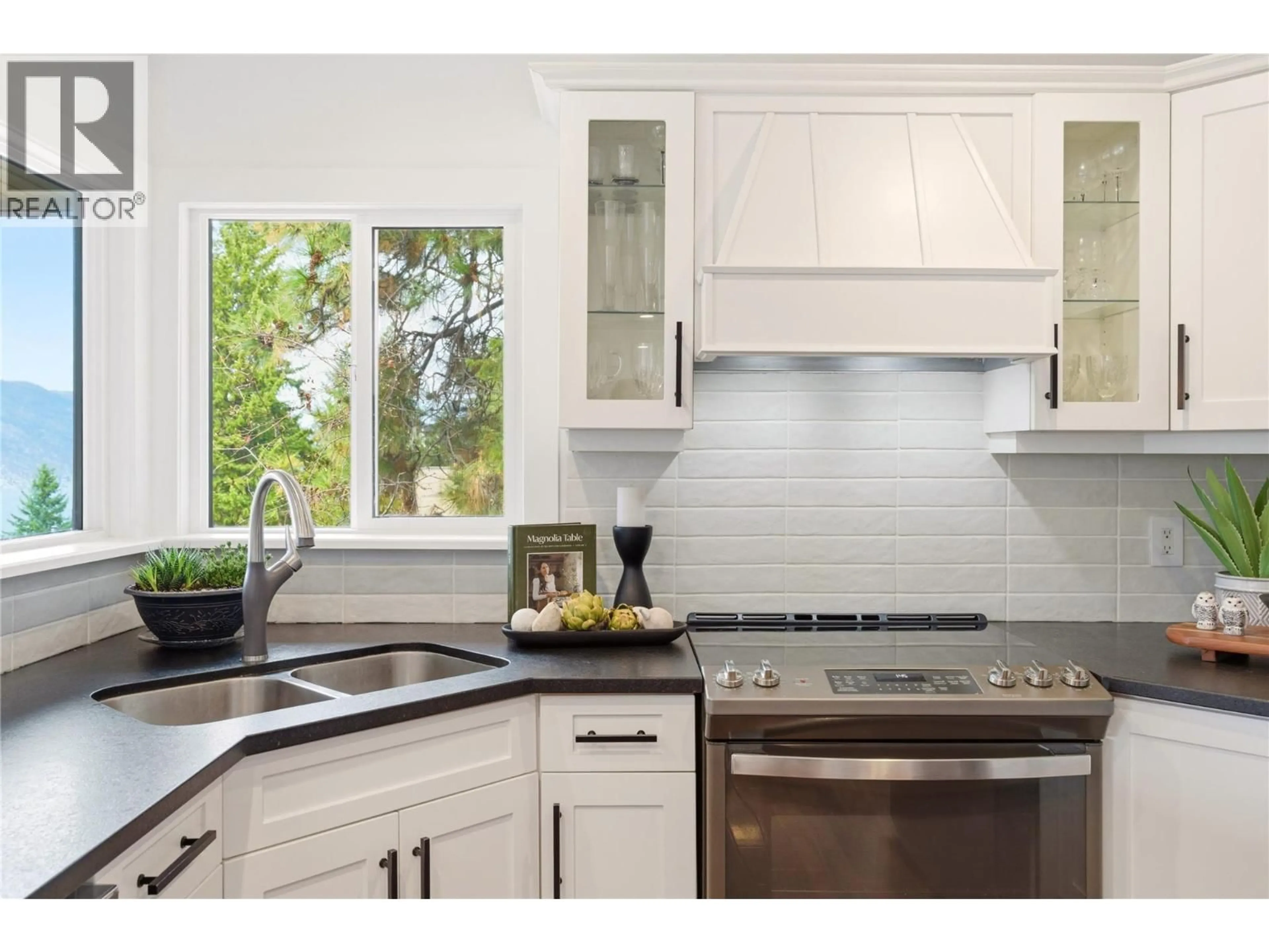 Contemporary kitchen, ceramic/tile floor for 1130 LYNN COURT, Kelowna British Columbia V1V1H1