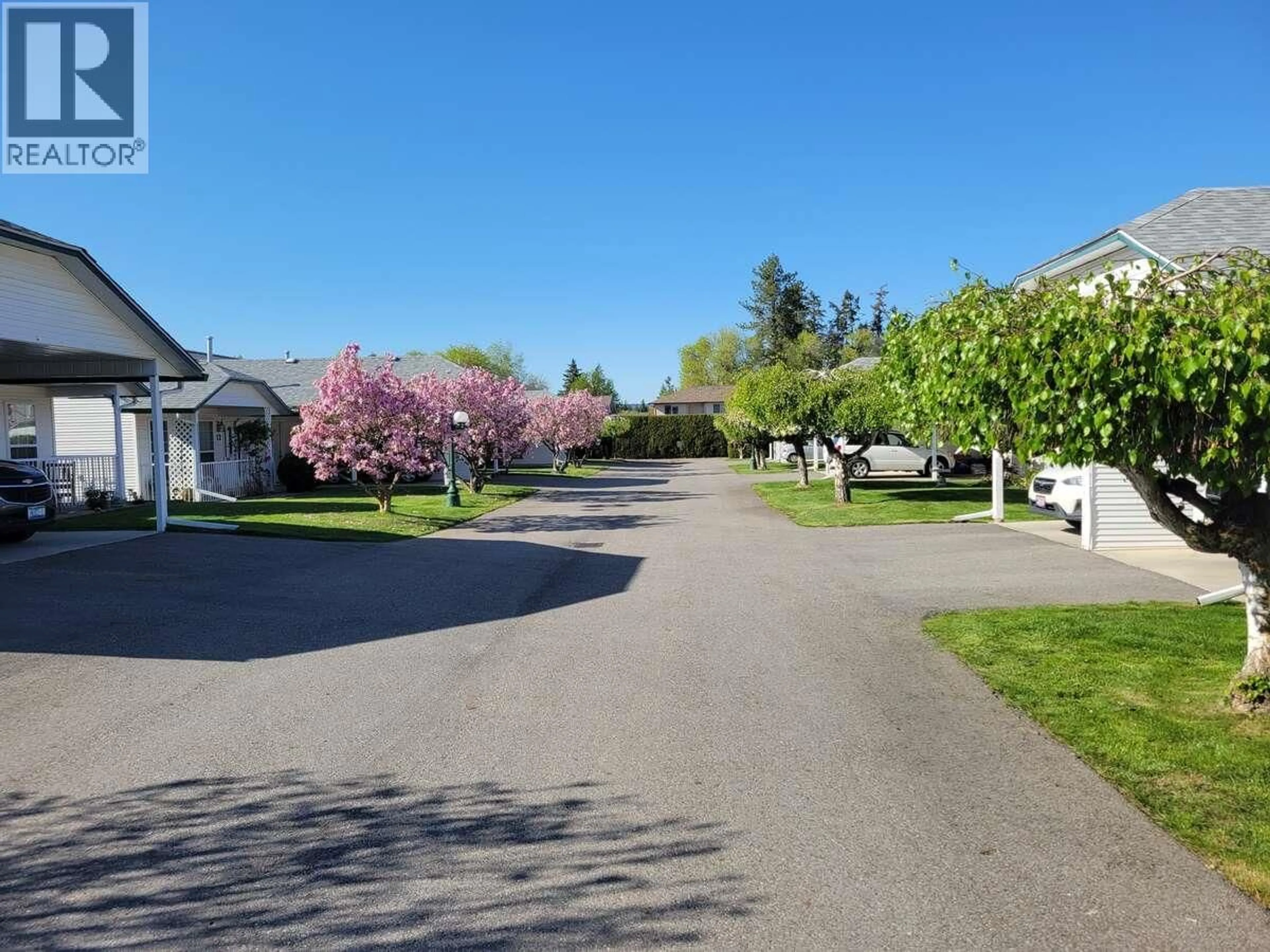 A pic from outside/outdoor area/front of a property/back of a property/a pic from drone, street for 4 - 3620 PATTEN DRIVE, Armstrong British Columbia V4Y2B4