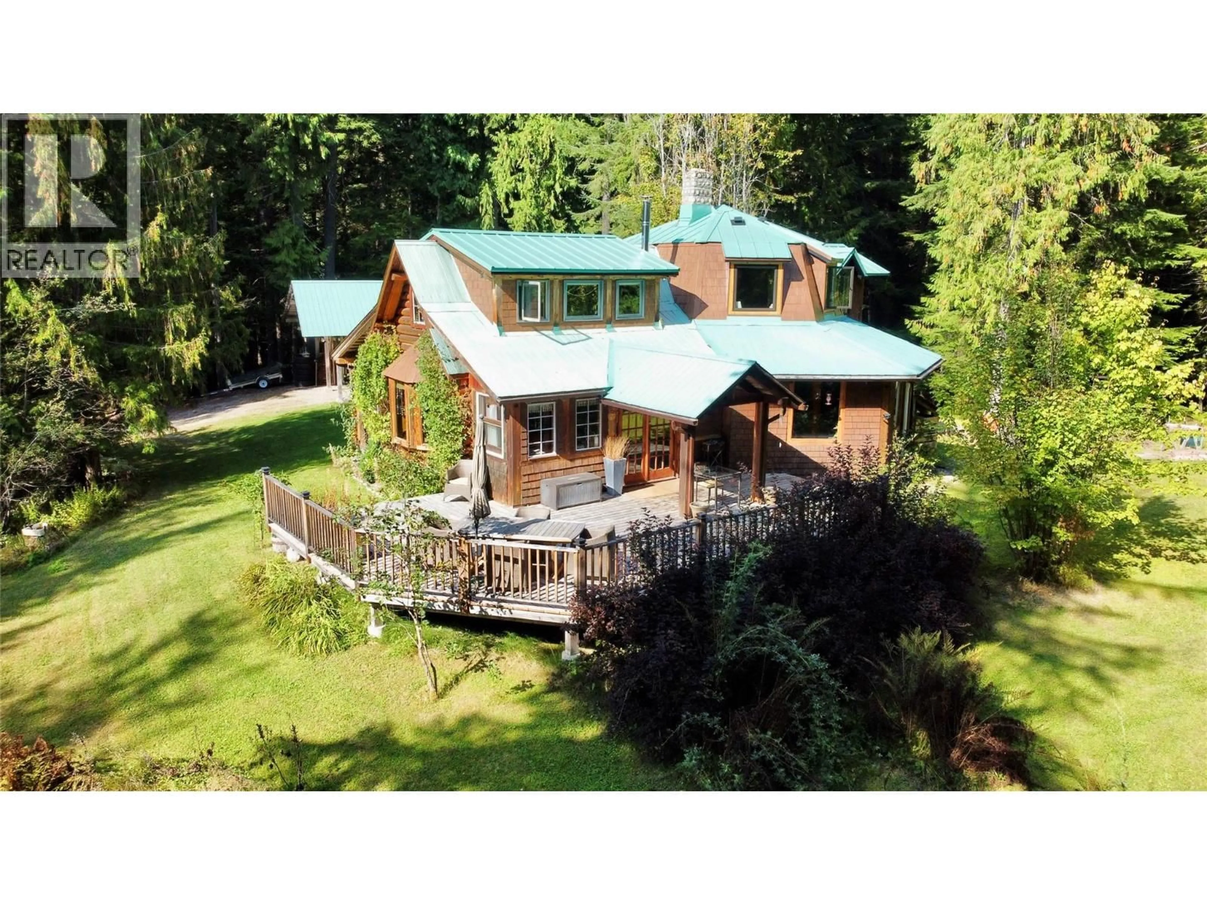 A pic from outside/outdoor area/front of a property/back of a property/a pic from drone, building for 785 BEECH ROAD, Nakusp British Columbia V0G1R1