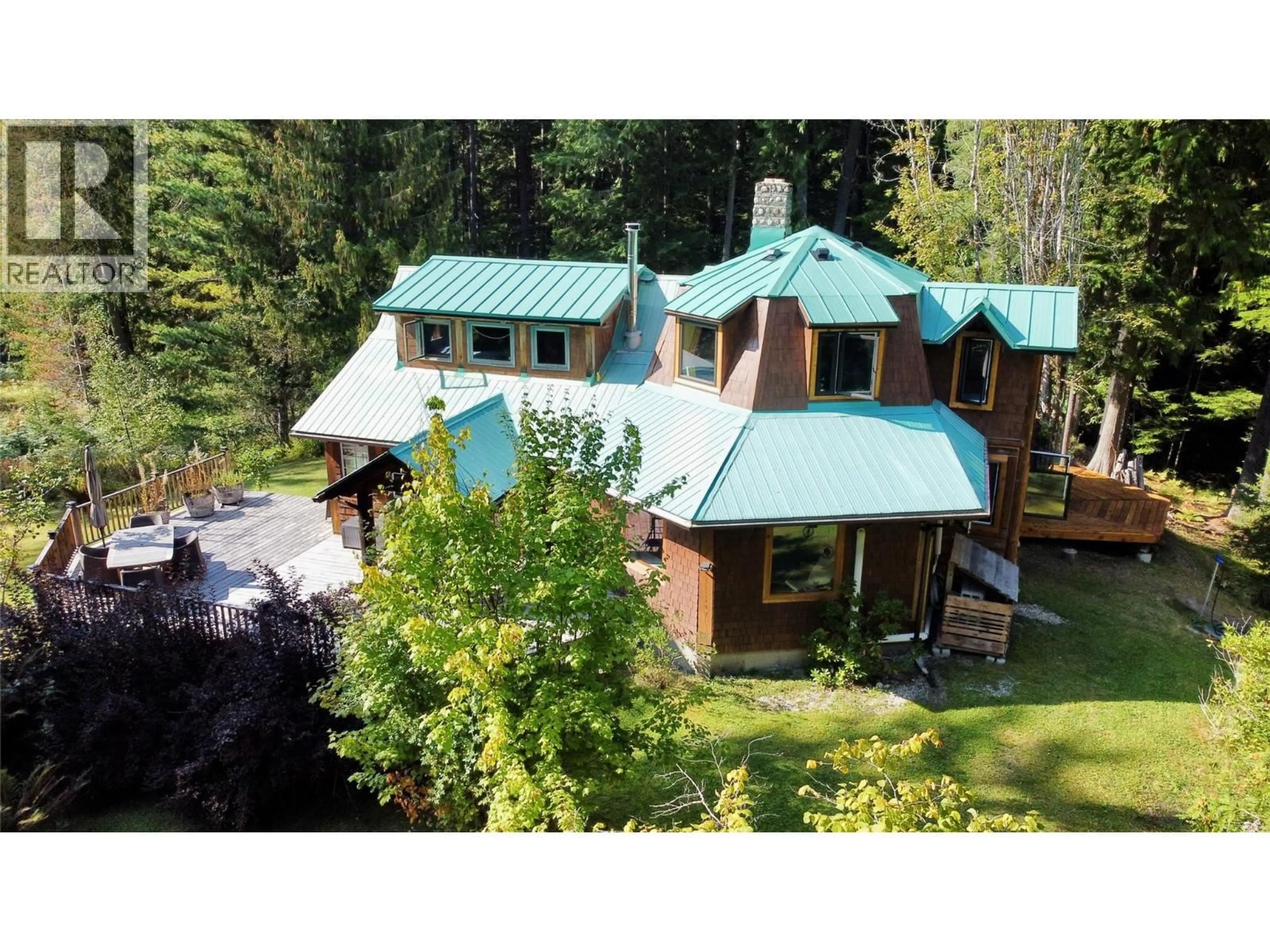 A pic from outside/outdoor area/front of a property/back of a property/a pic from drone, unknown for 785 BEECH ROAD, Nakusp British Columbia V0G1R1