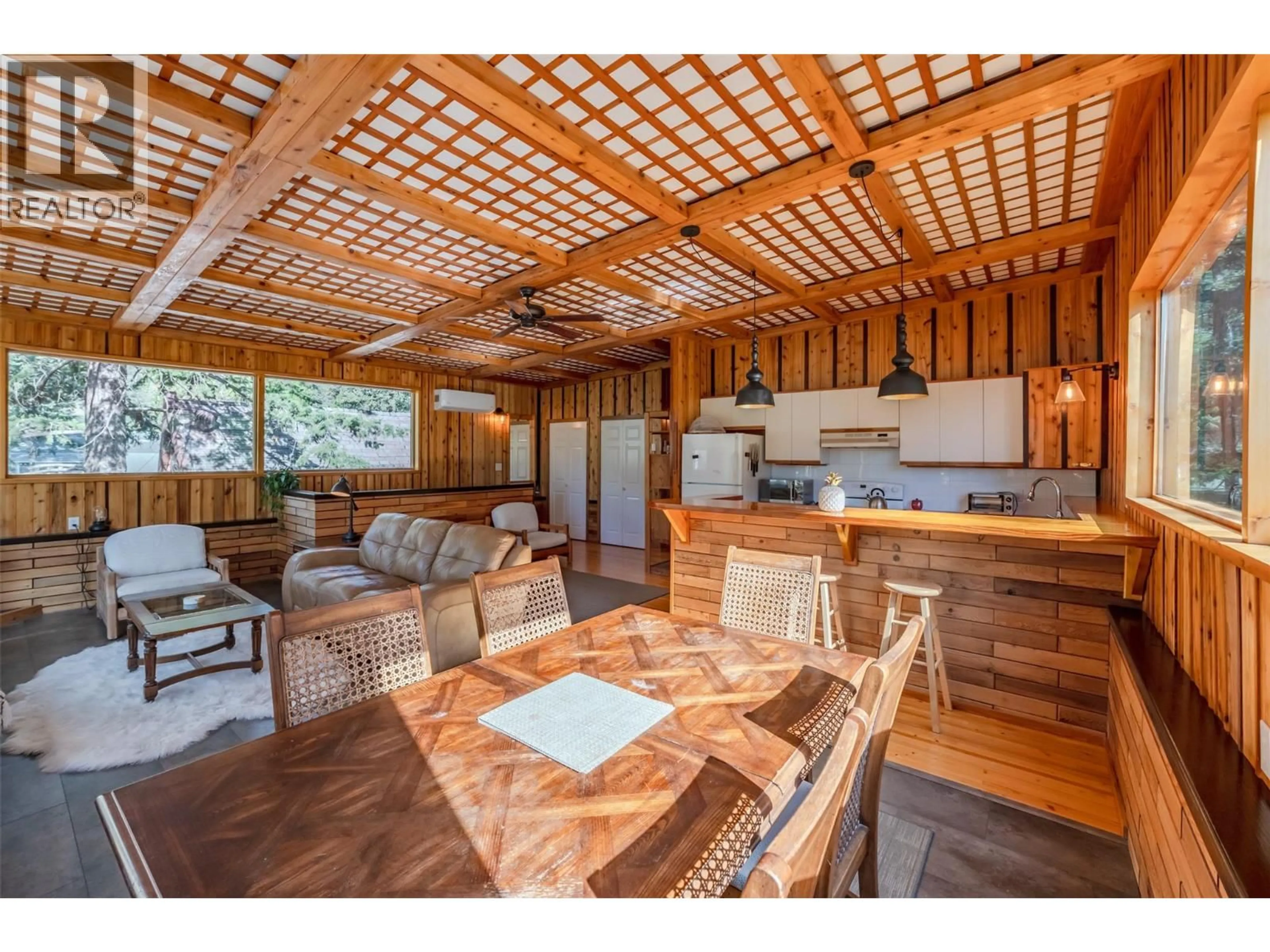 Open concept kitchen, wood/laminate floor for 2636 11TH STREET, Olalla British Columbia V0X1N6