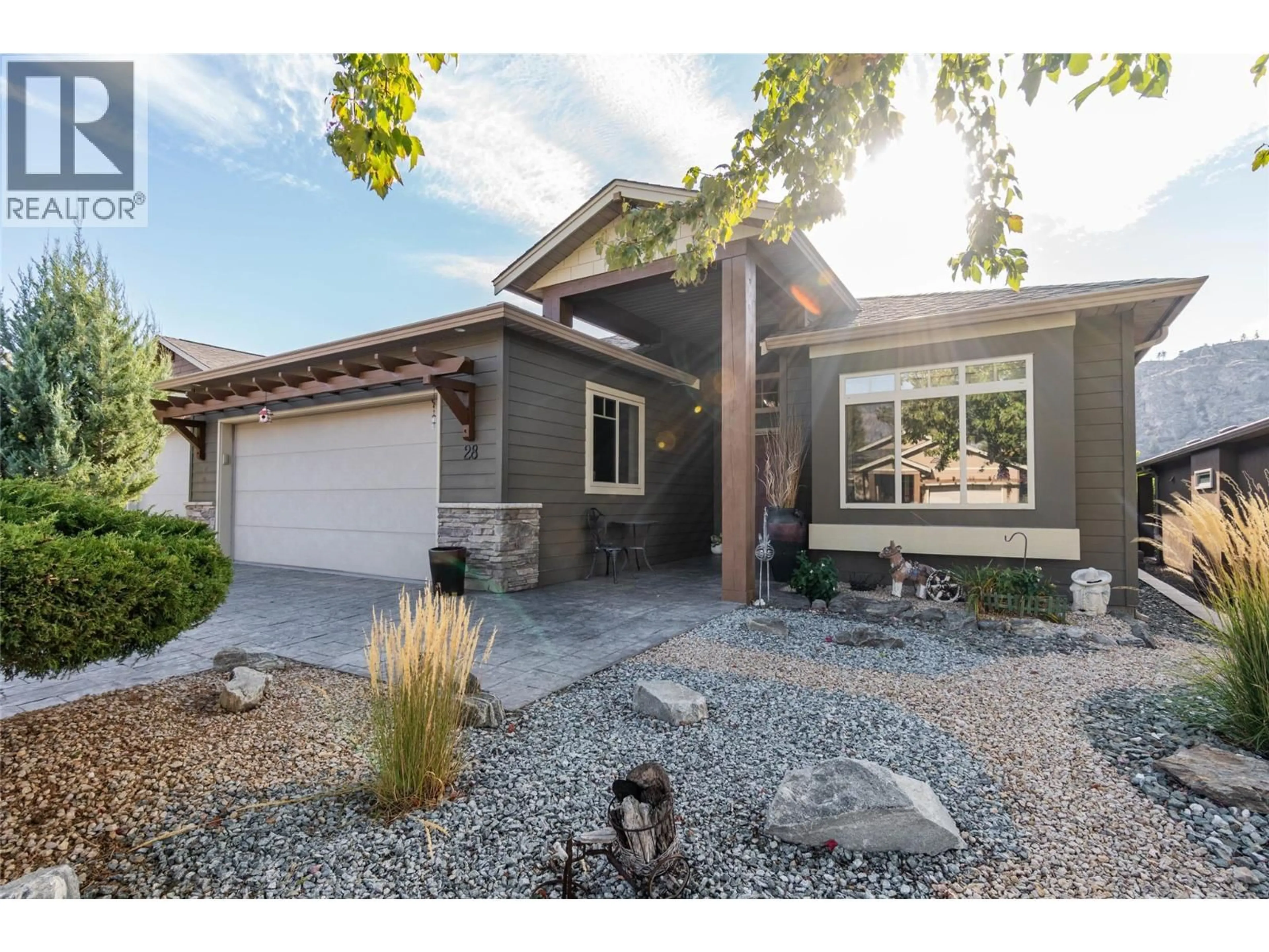 Home with vinyl exterior material, street for 28 - 6833 MEADOWS DRIVE, Oliver British Columbia V0H1T4