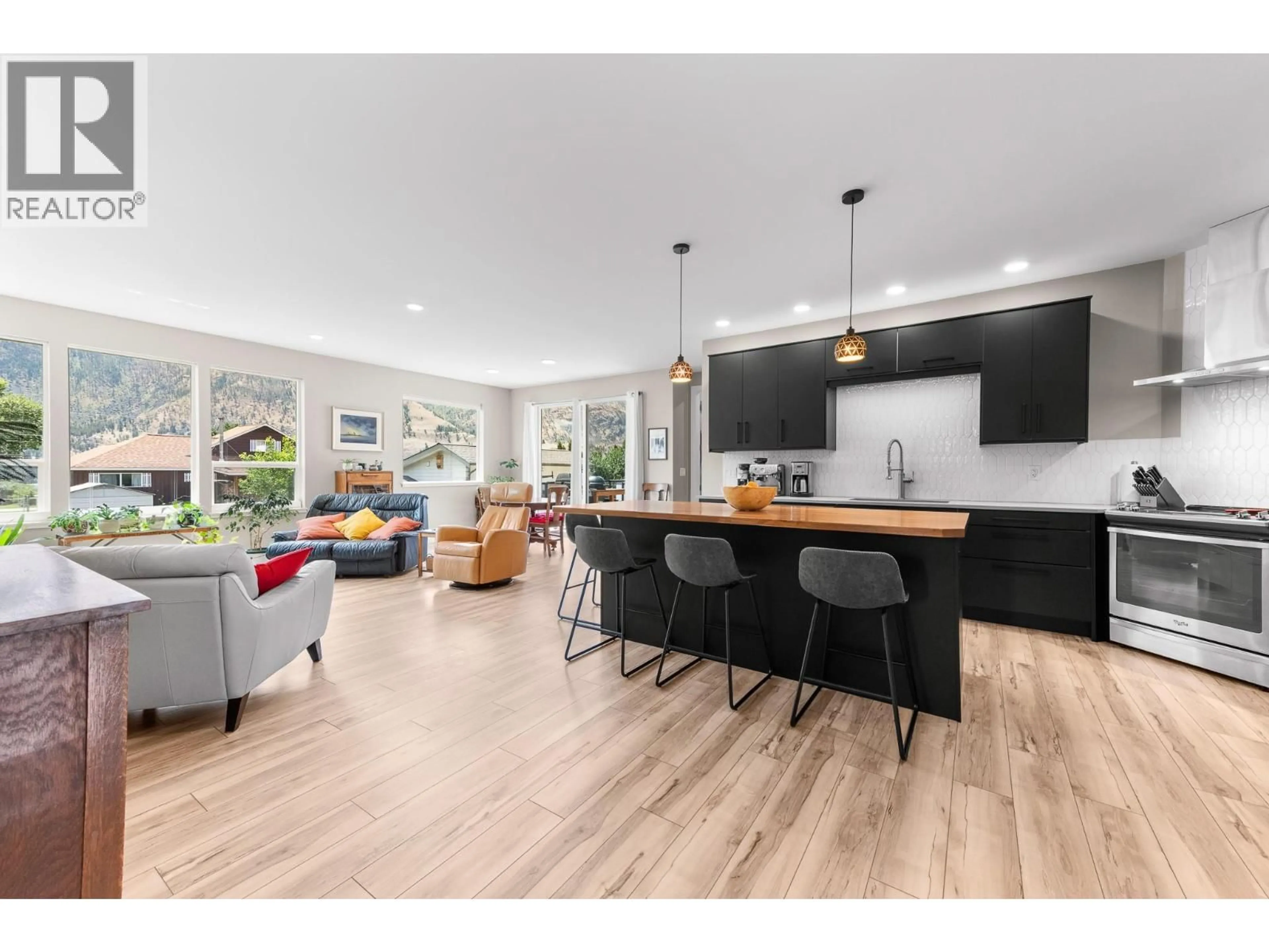 Open concept kitchen, wood/laminate floor for 617 2ND AVENUE, Keremeos British Columbia V0X1N2