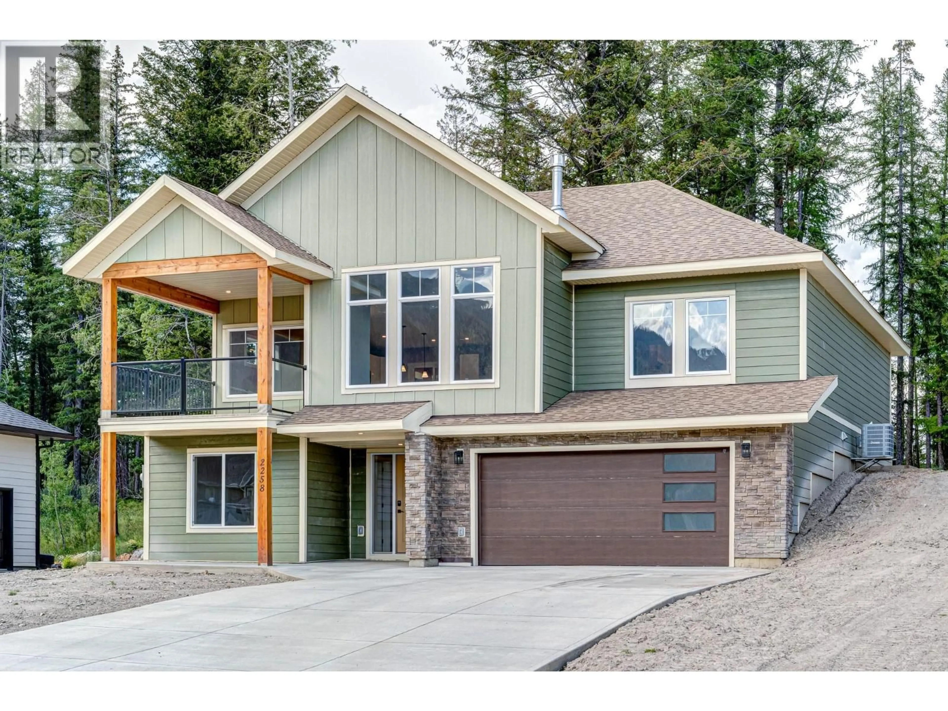 Home with vinyl exterior material, mountain view for 2258 BLACK HAWK DRIVE, Sparwood British Columbia V0B2G2