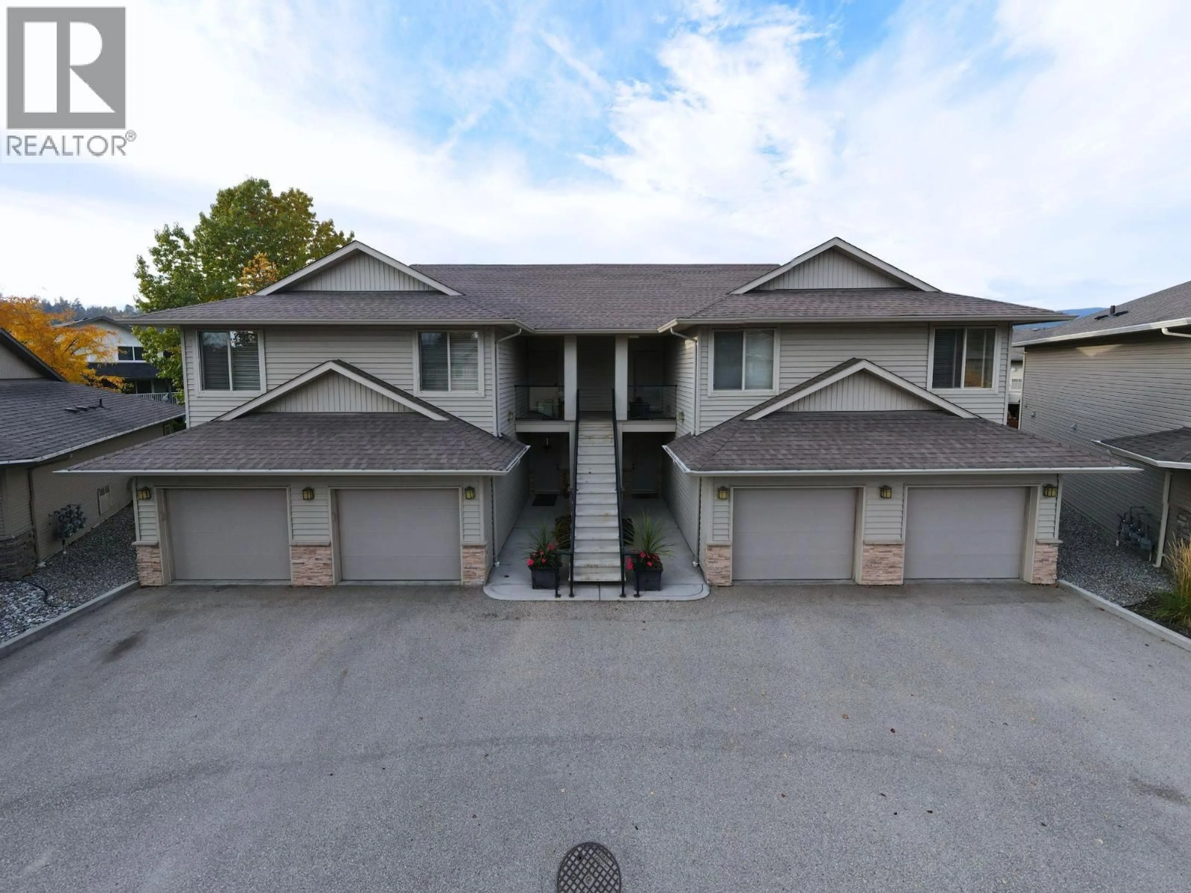 A pic from outside/outdoor area/front of a property/back of a property/a pic from drone, building for 603 - 3350 WOODSDALE ROAD, Lake Country British Columbia V4V1X6