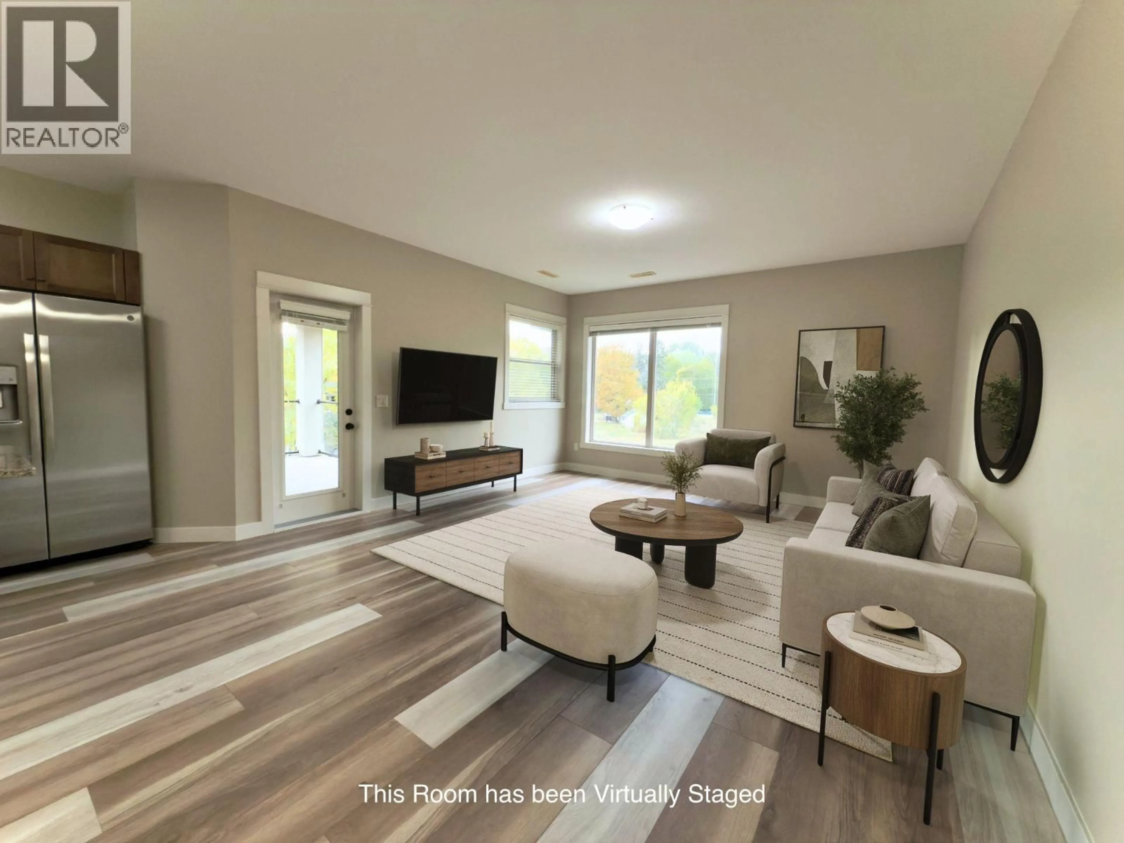 Living room with furniture, unknown for 603 - 3350 WOODSDALE ROAD, Lake Country British Columbia V4V1X6