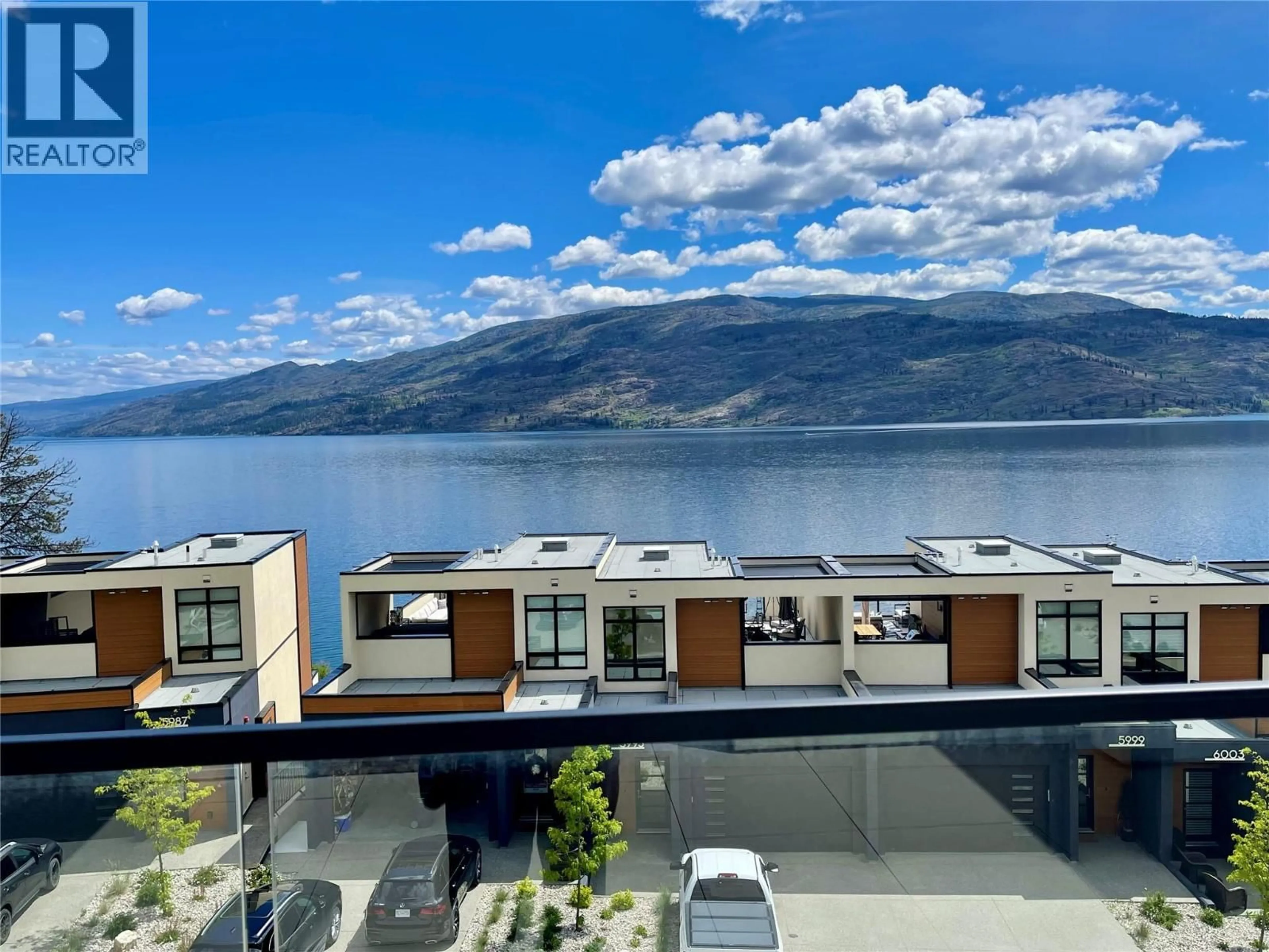A pic from outside/outdoor area/front of a property/back of a property/a pic from drone, water/lake/river/ocean view for 5992 PRINCESS STREET, Peachland British Columbia V0H1X7