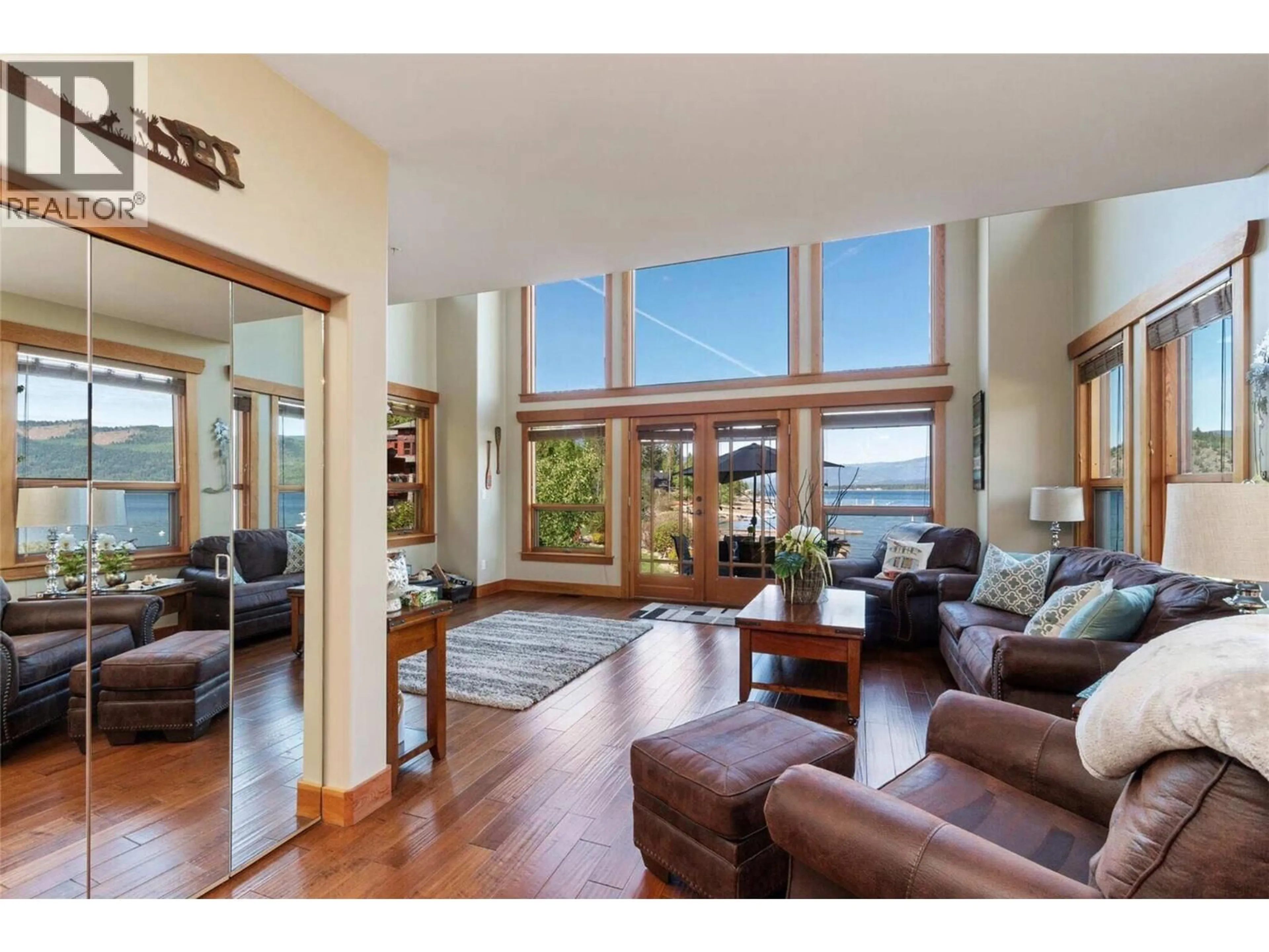 Living room with furniture, wood/laminate floor for 1 - 2479 EAGLE BAY ROAD, Blind Bay British Columbia V0E1H1