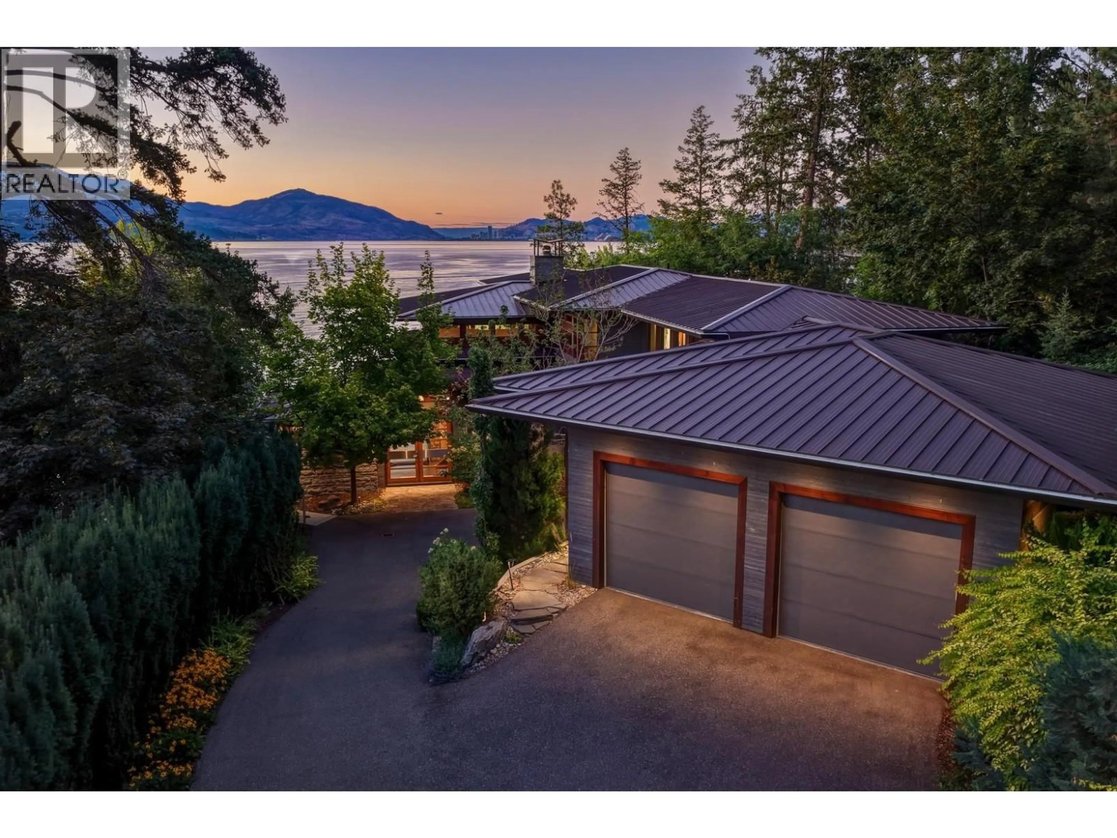 A pic from outside/outdoor area/front of a property/back of a property/a pic from drone, water/lake/river/ocean view for 4896 LAKESHORE ROAD, Kelowna British Columbia V1W4H7
