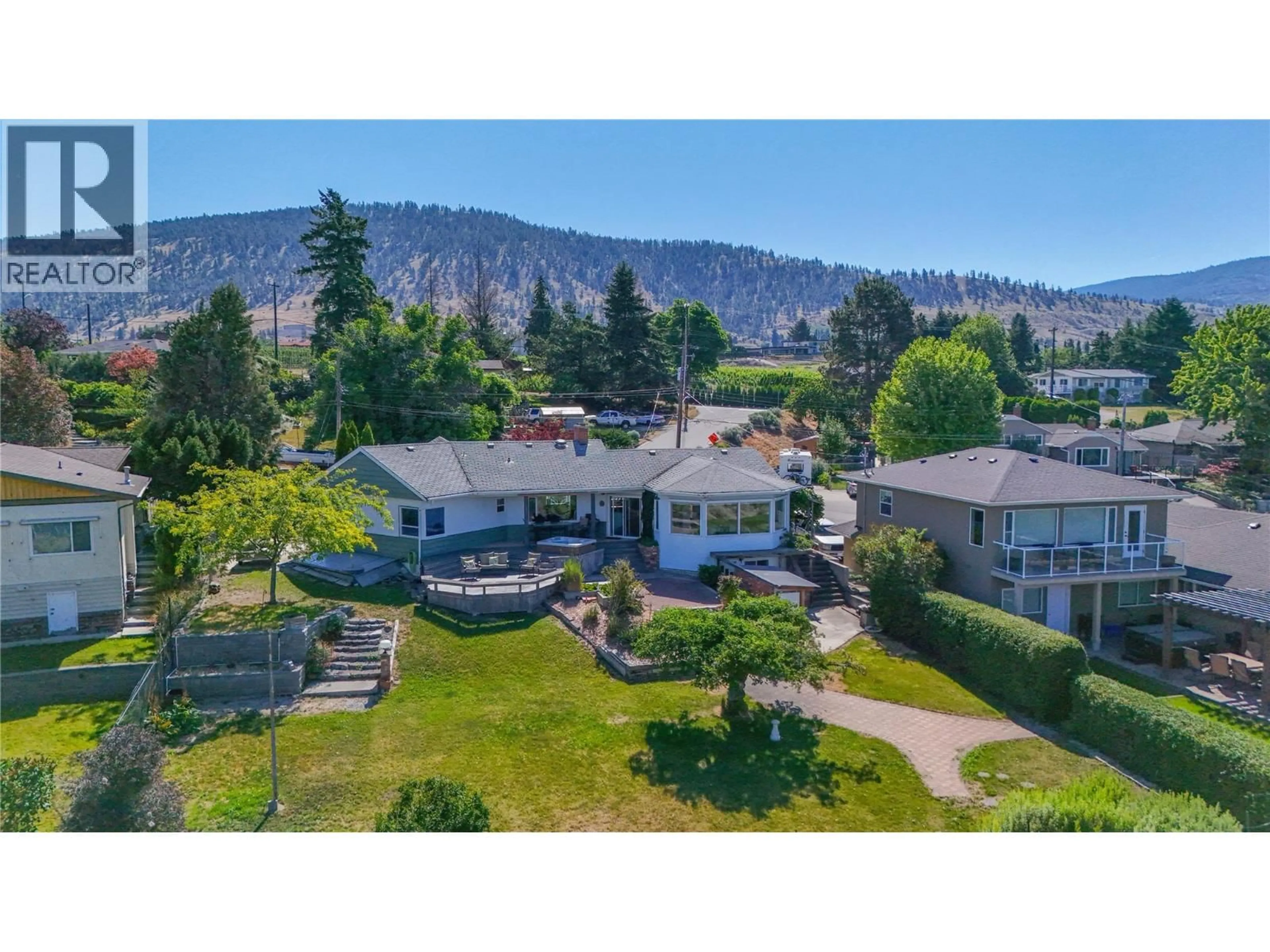 A pic from outside/outdoor area/front of a property/back of a property/a pic from drone, mountain view for 198 BANKVIEW PLACE, Penticton British Columbia V2A1B4