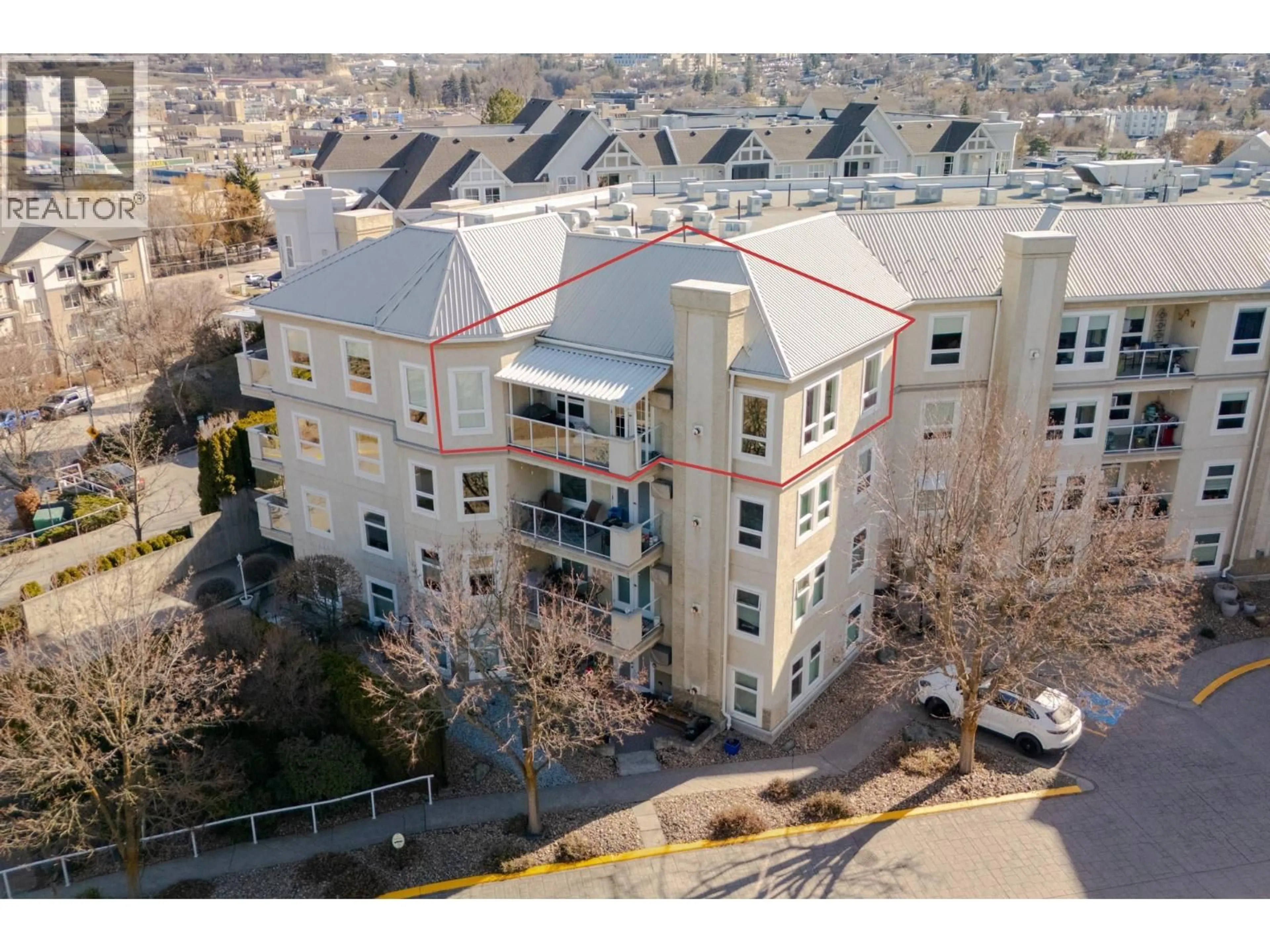 A pic from outside/outdoor area/front of a property/back of a property/a pic from drone, city buildings view from balcony for 414 - 3300 CENTENNIAL DRIVE, Vernon British Columbia V1T9M5