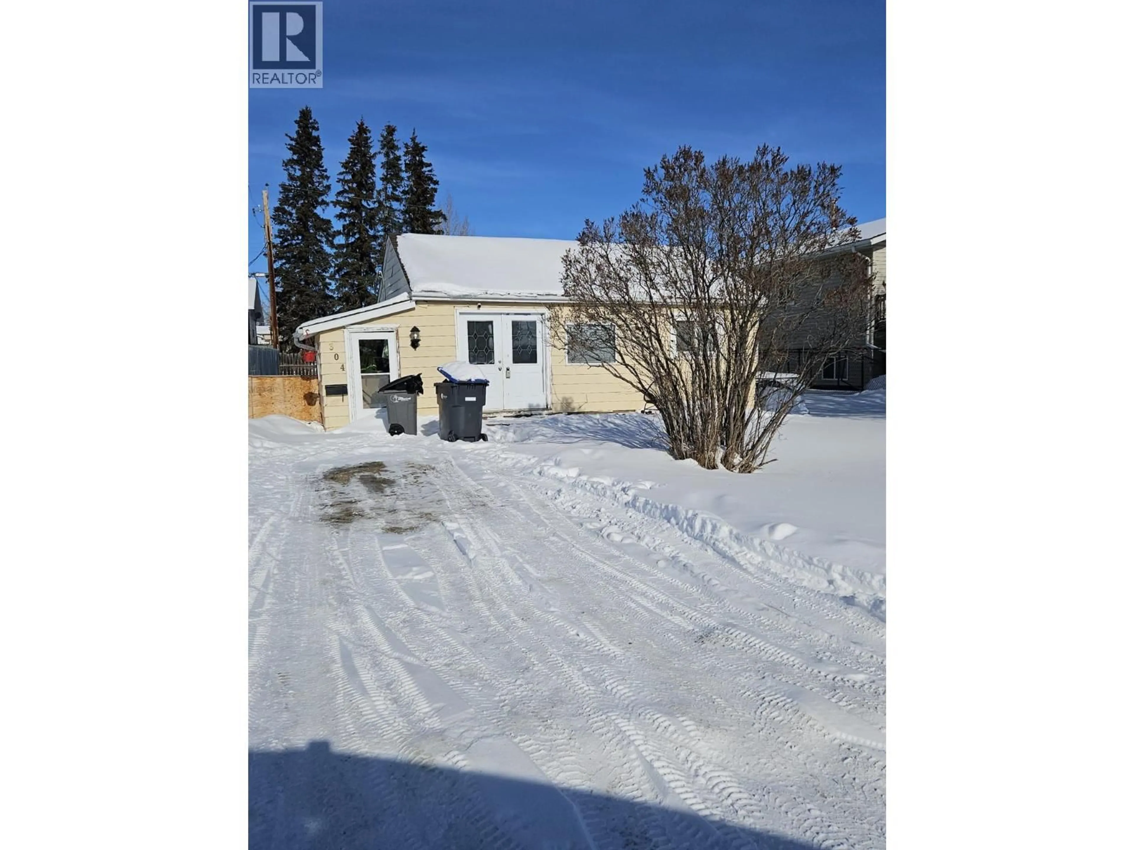 A pic from outside/outdoor area/front of a property/back of a property/a pic from drone, street for 304 100 AVENUE, Dawson Creek British Columbia V1G1V5