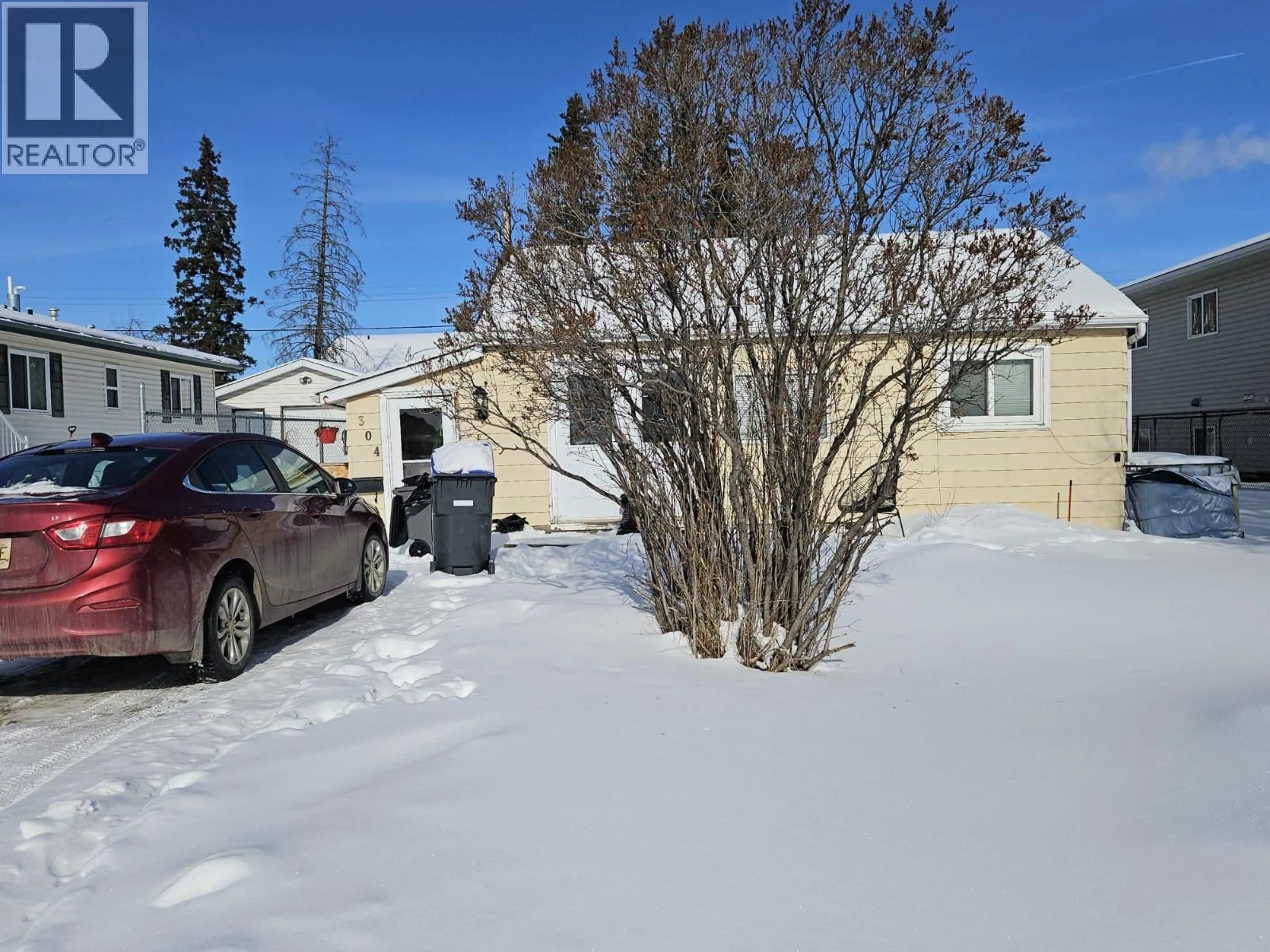 A pic from outside/outdoor area/front of a property/back of a property/a pic from drone, street for 304 100 AVENUE, Dawson Creek British Columbia V1G1V5