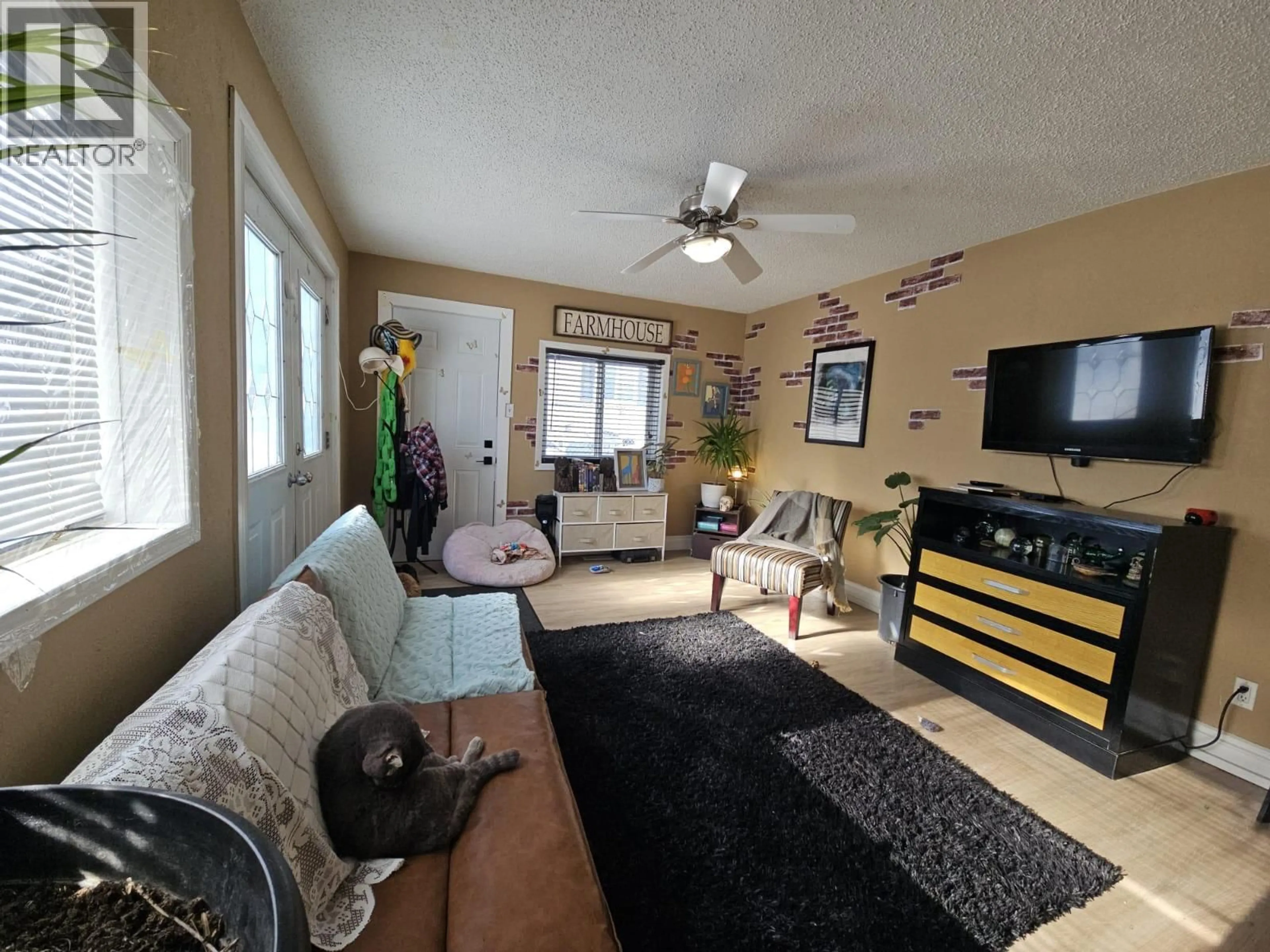 Living room with furniture, unknown for 304 100 AVENUE, Dawson Creek British Columbia V1G1V5