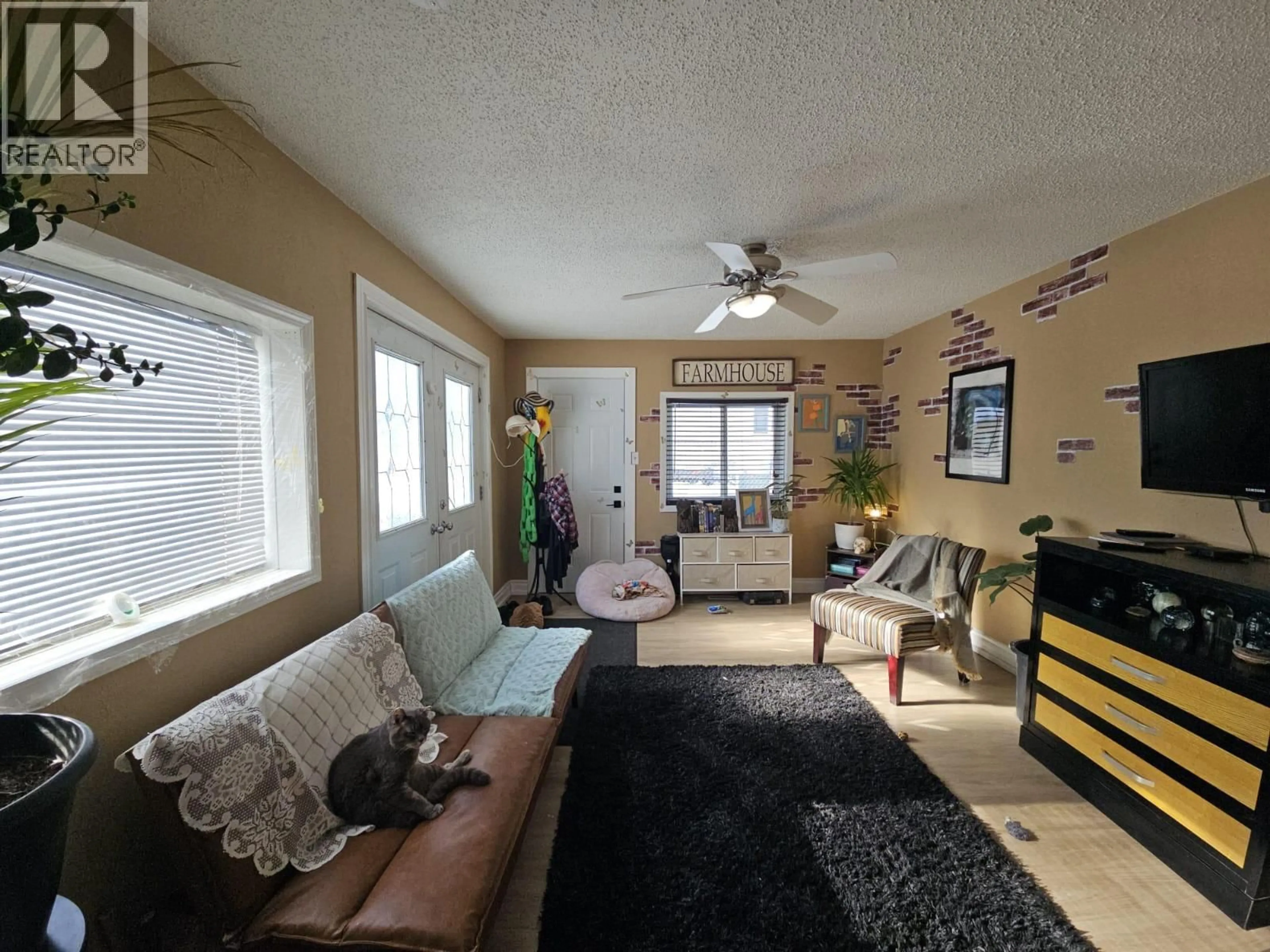 Living room with furniture, unknown for 304 100 AVENUE, Dawson Creek British Columbia V1G1V5