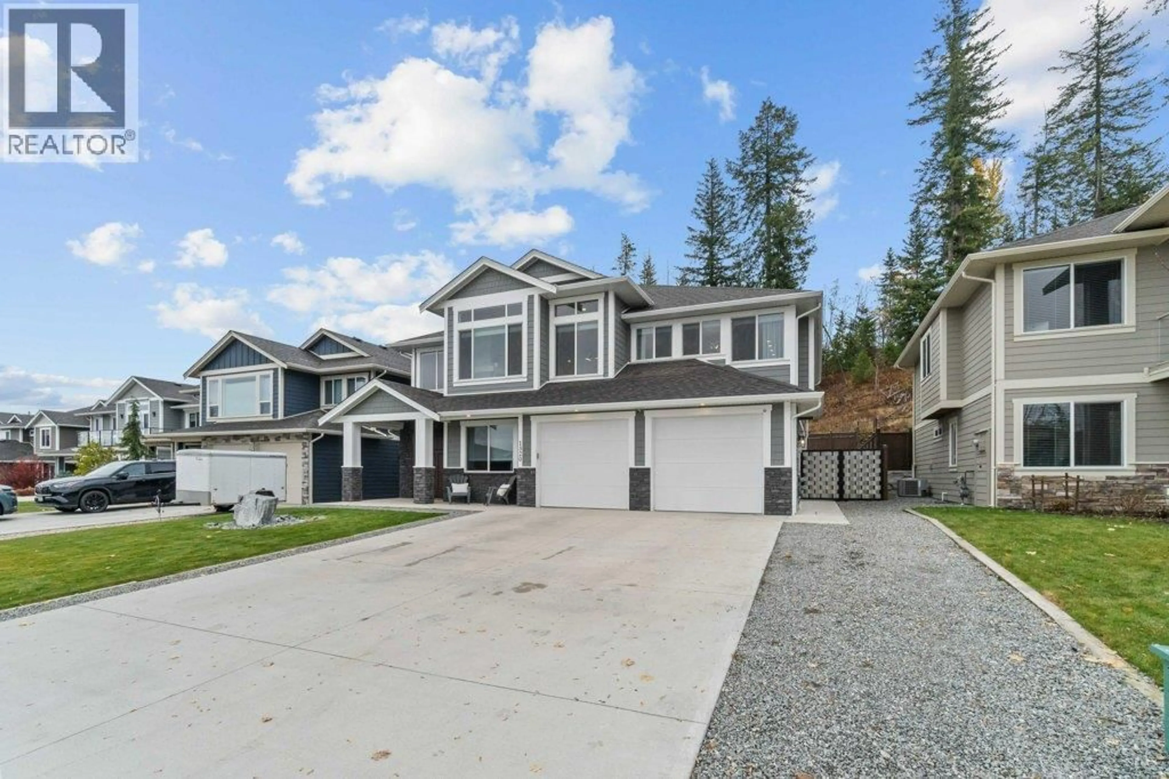 Home with vinyl exterior material, street for 1320 24 STREET SOUTHEAST, Salmon Arm British Columbia V1E0E3
