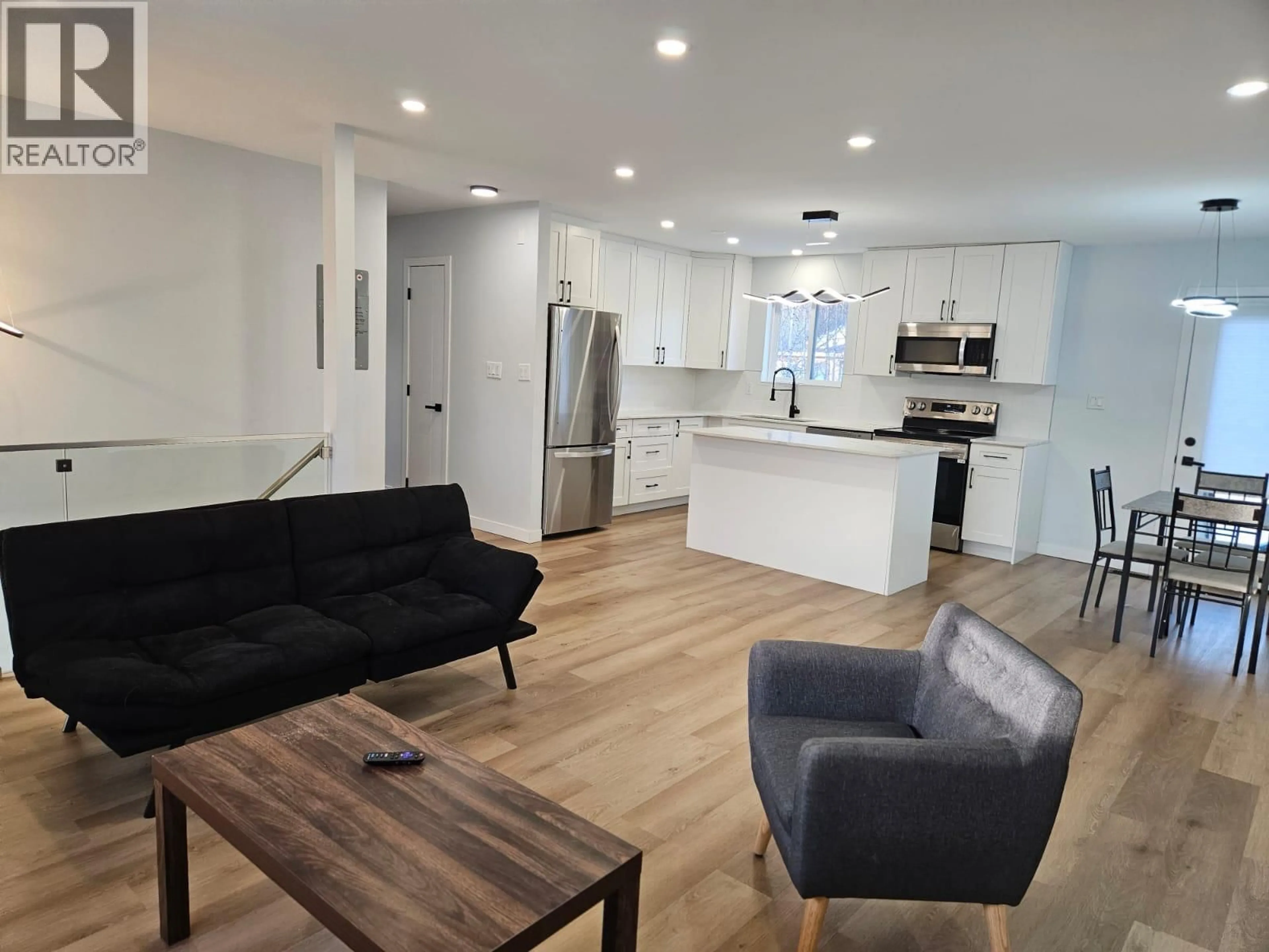 Open concept kitchen, wood/laminate floor for 5121 NICHOLSON ROAD, Chetwynd British Columbia V0C1J0