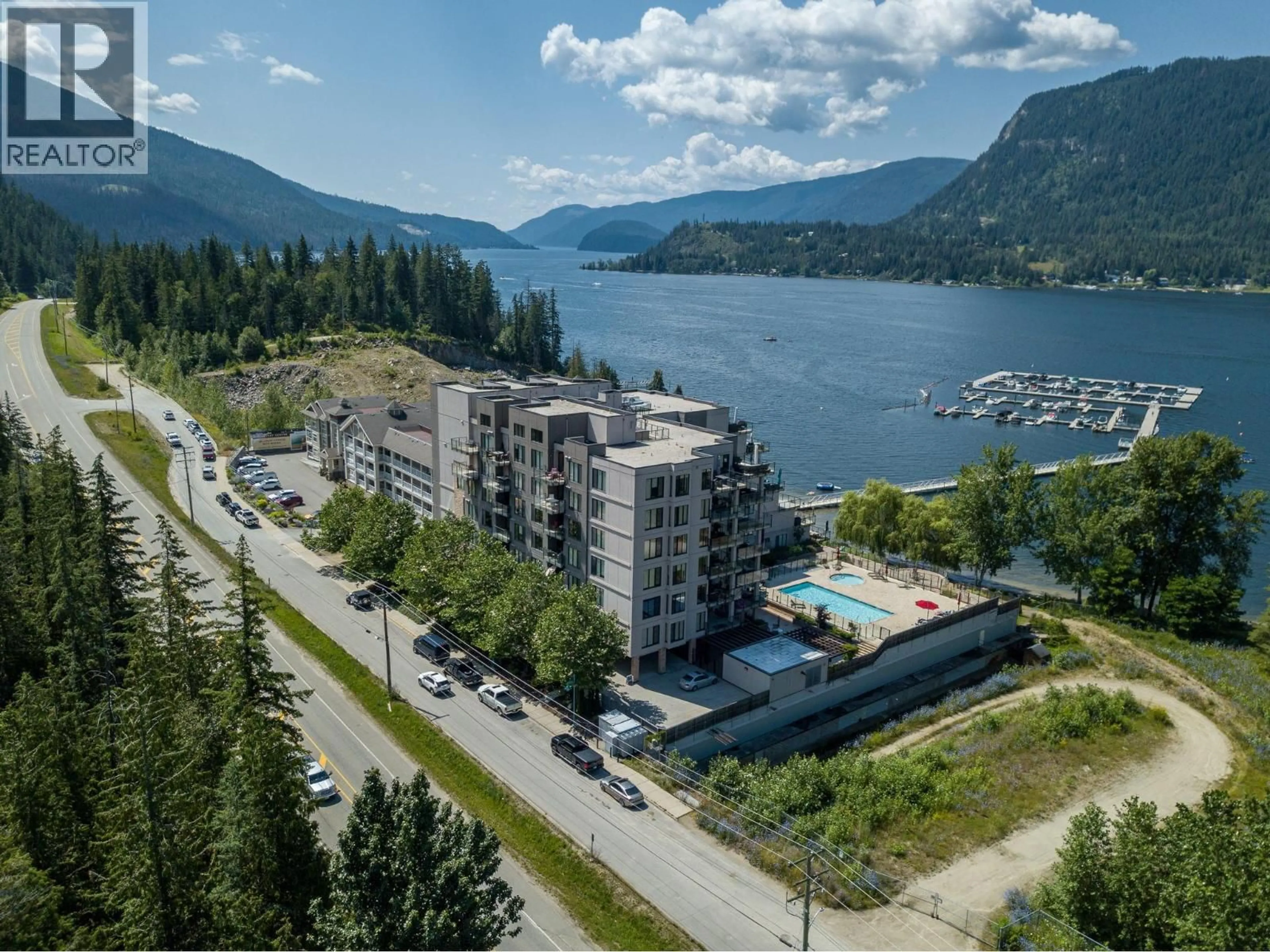 A pic from outside/outdoor area/front of a property/back of a property/a pic from drone, water/lake/river/ocean view for 309 - 326 MARA LAKE LANE, Sicamous British Columbia V0E2V0