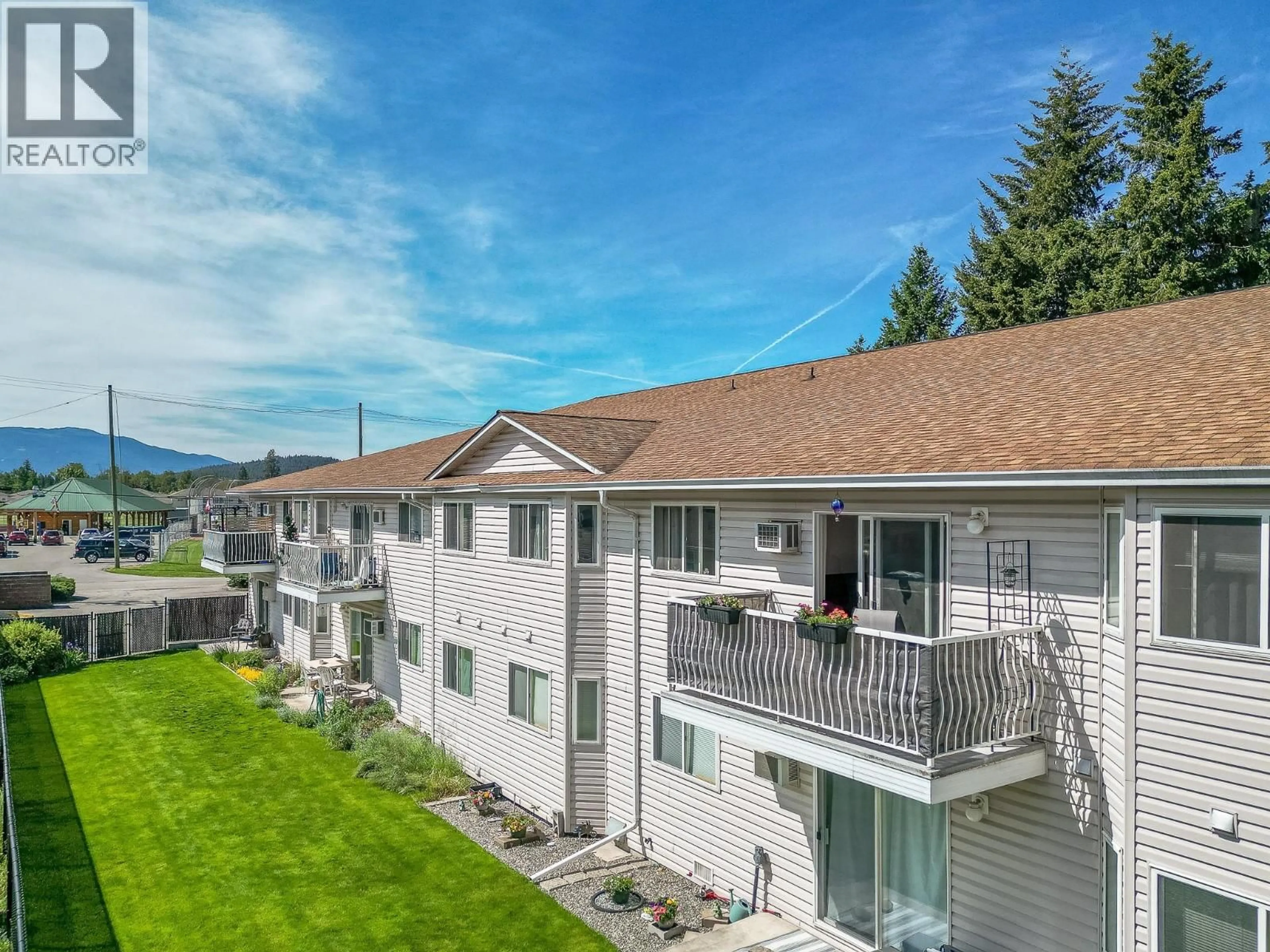 A pic from outside/outdoor area/front of a property/back of a property/a pic from drone, mountain view for 214 - 211 KILDONAN AVENUE, Enderby British Columbia V0E1V2