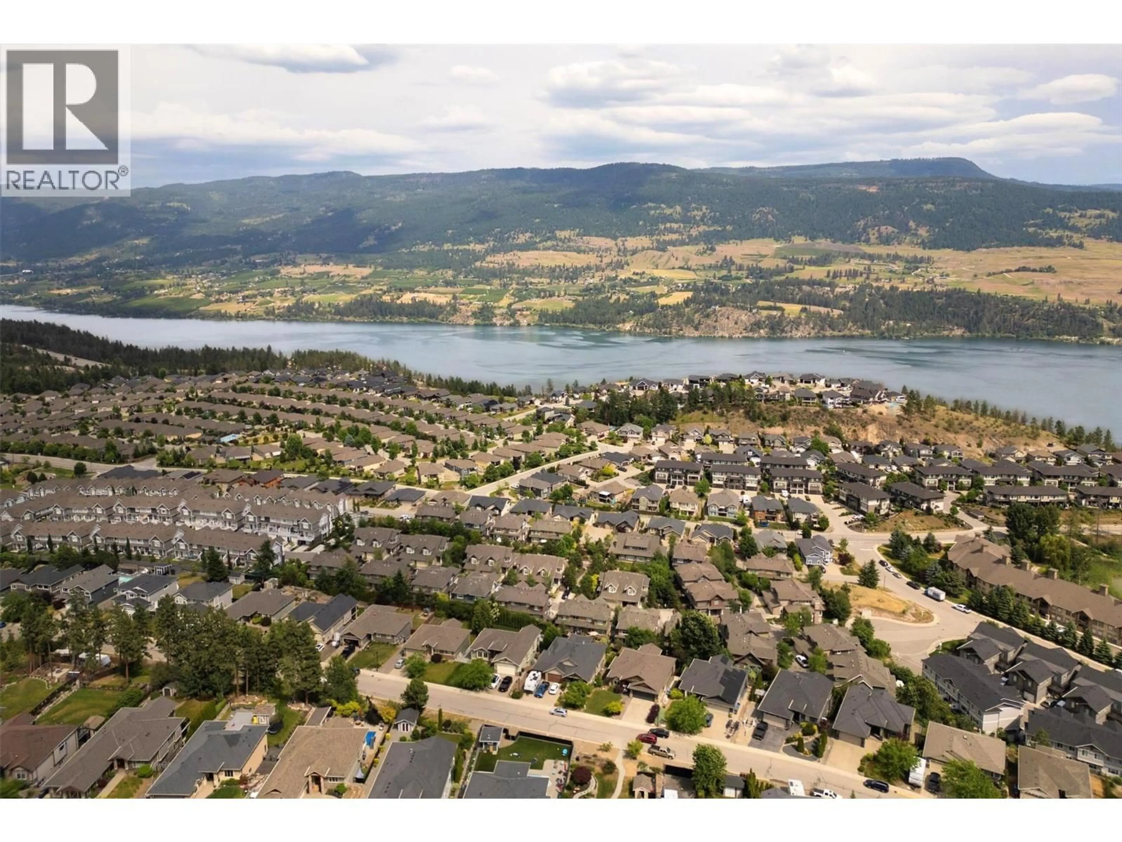 A pic from outside/outdoor area/front of a property/back of a property/a pic from drone, water/lake/river/ocean view for 11 - 12850 STILLWATER COURT, Lake Country British Columbia V4V2S9