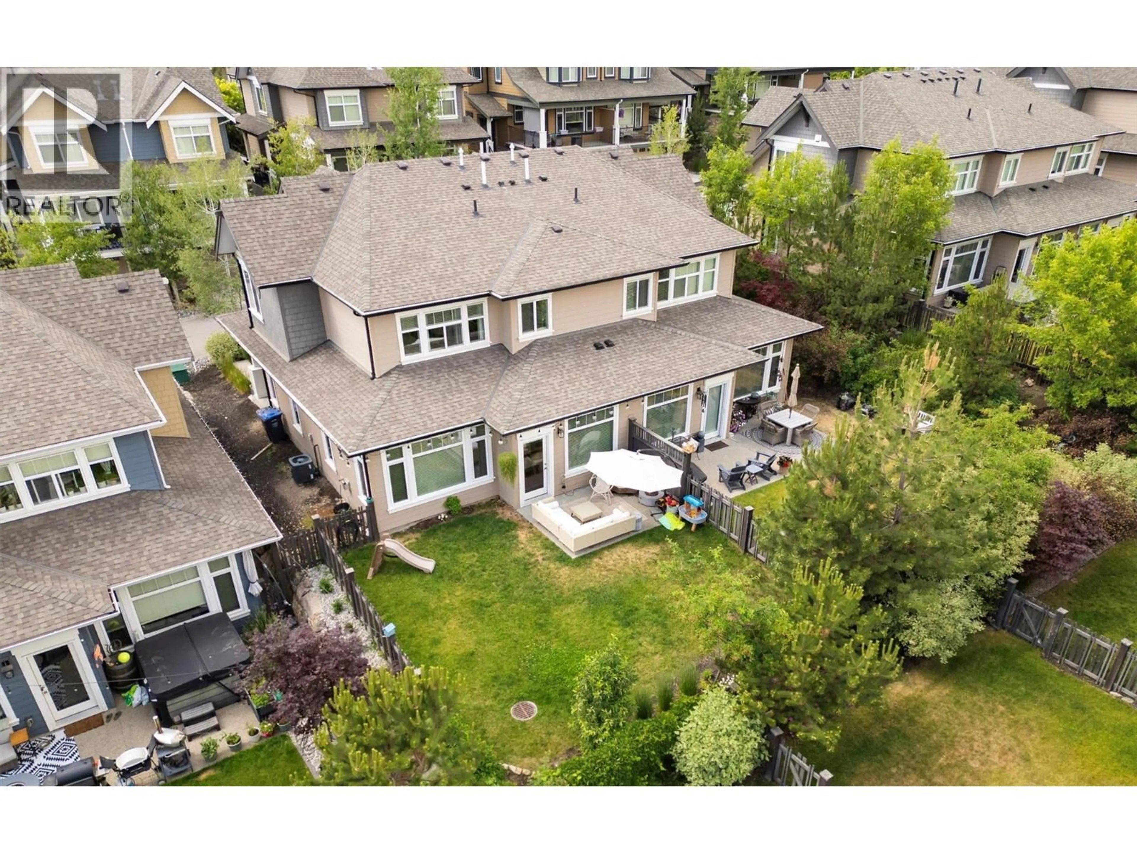 A pic from outside/outdoor area/front of a property/back of a property/a pic from drone, street for 11 - 12850 STILLWATER COURT, Lake Country British Columbia V4V2S9