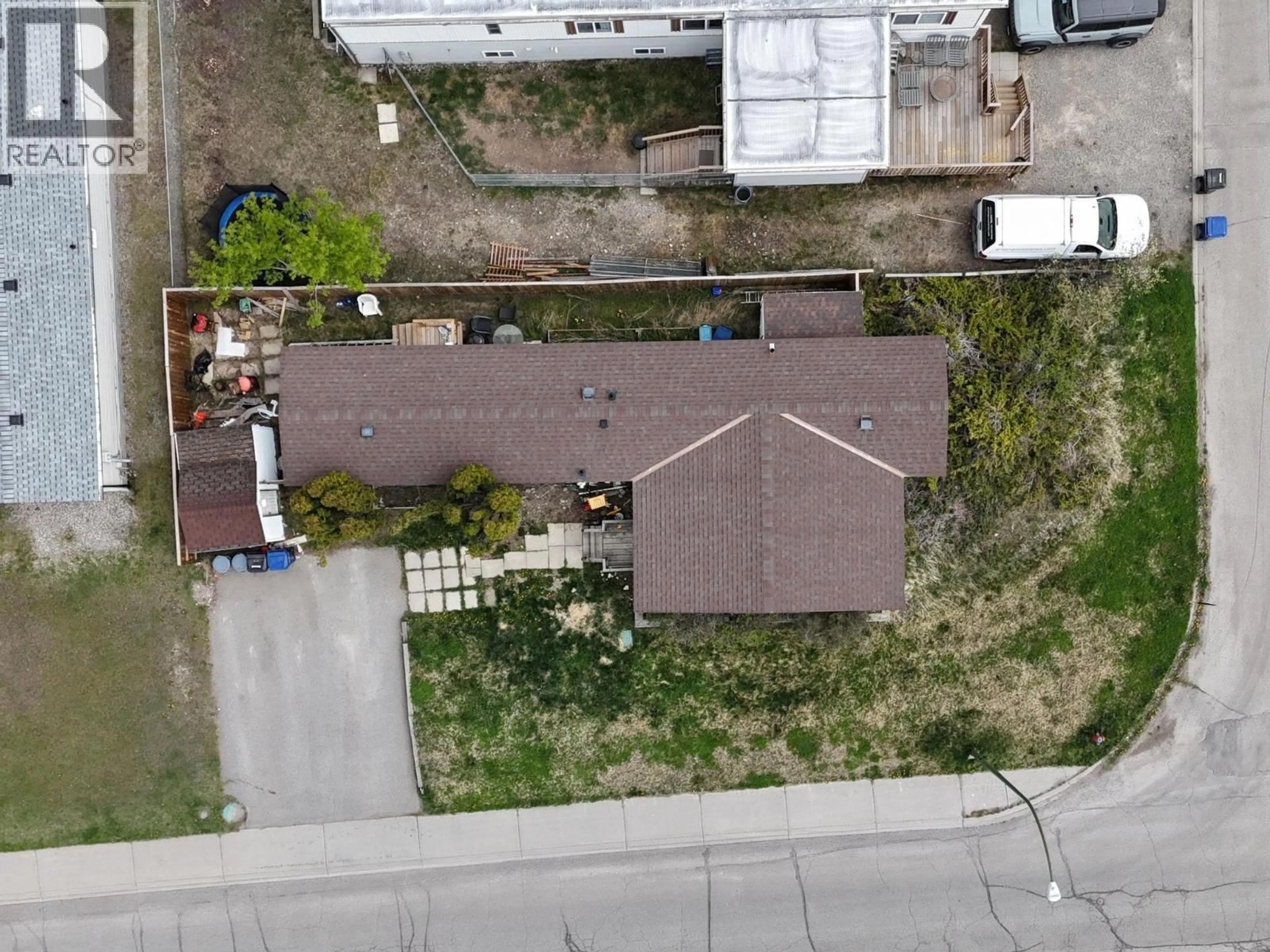 A pic from outside/outdoor area/front of a property/back of a property/a pic from drone, street for 1800 KOKANEE CRESCENT NORTH, Cranbrook British Columbia V1C5W4