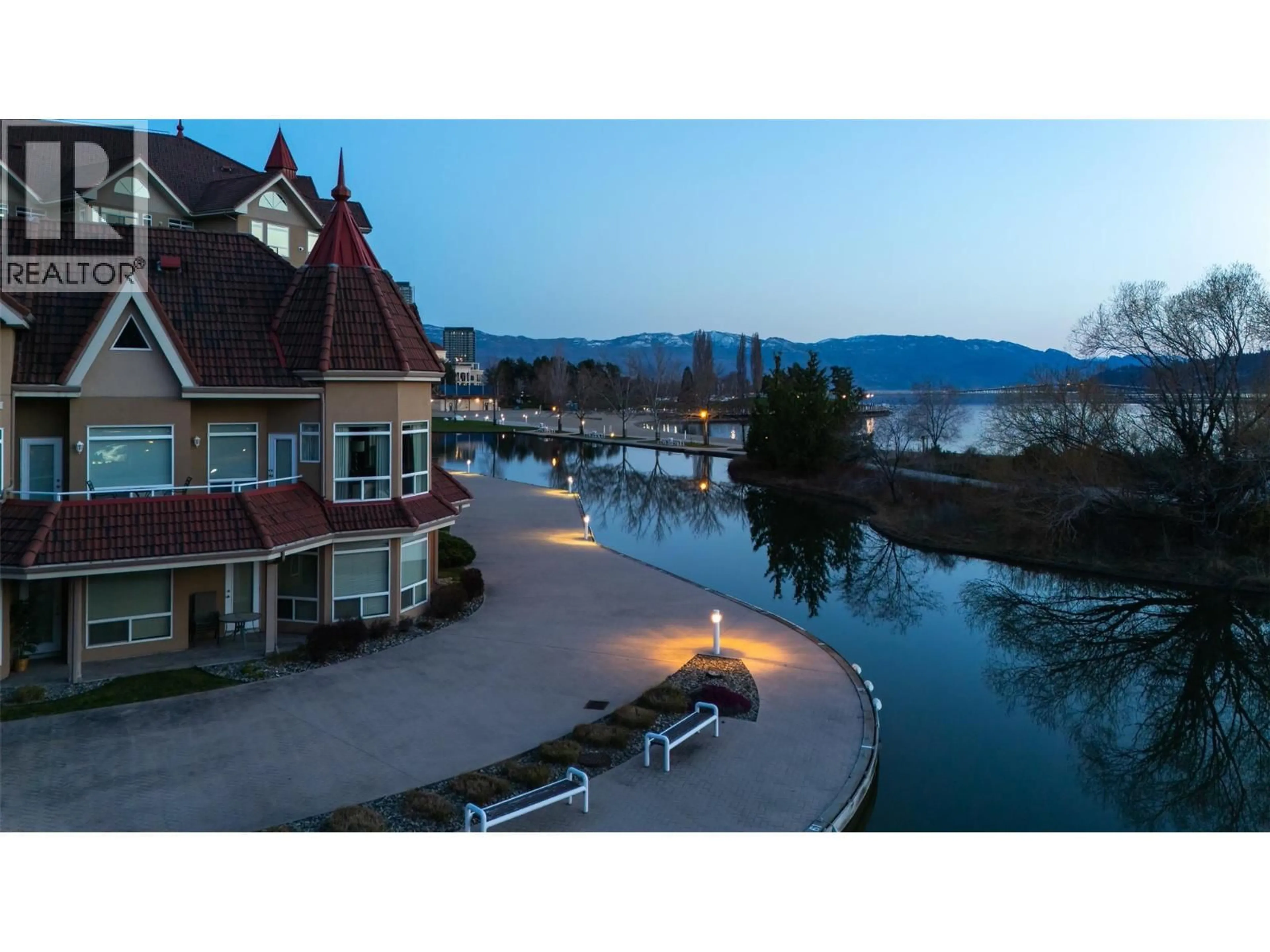 A pic from outside/outdoor area/front of a property/back of a property/a pic from drone, water/lake/river/ocean view for 221 - 1088 SUNSET DRIVE, Kelowna British Columbia V1Y9W1