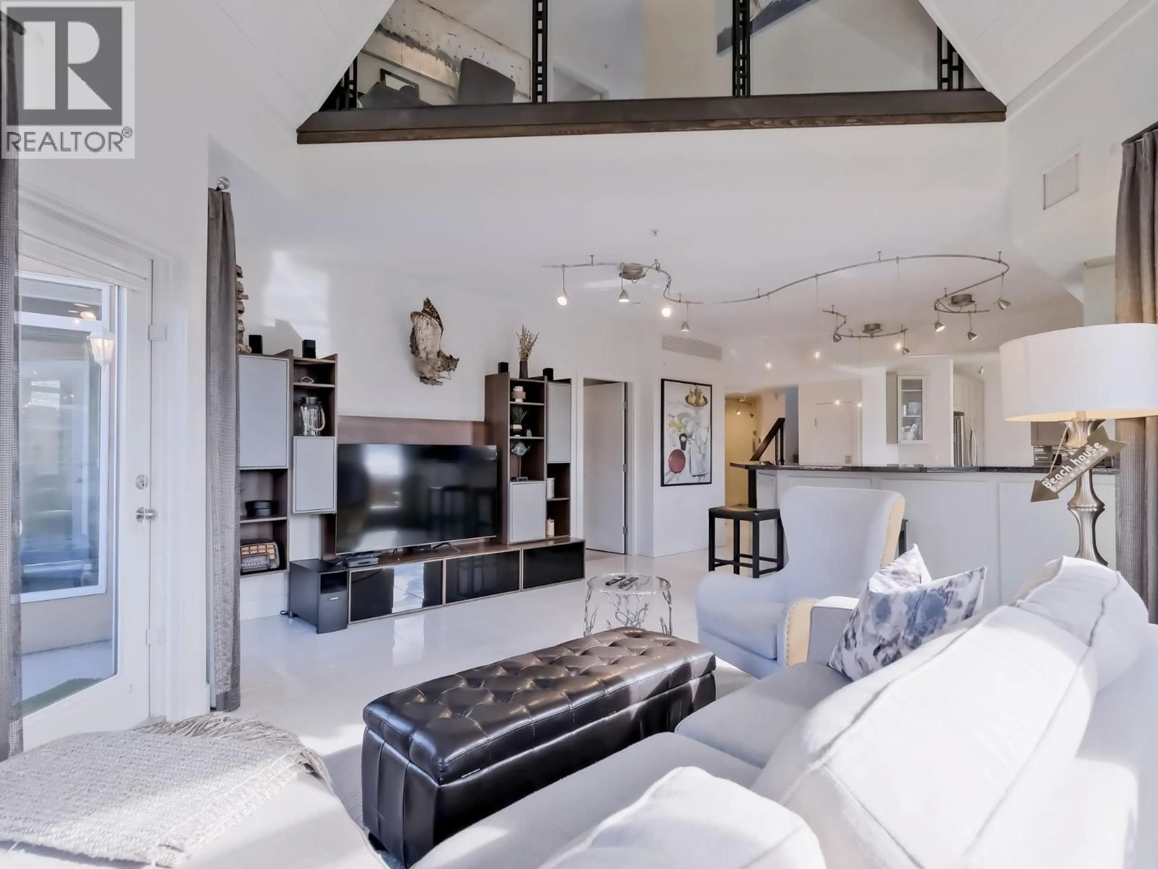 Living room with furniture, unknown for 221 - 1088 SUNSET DRIVE, Kelowna British Columbia V1Y9W1