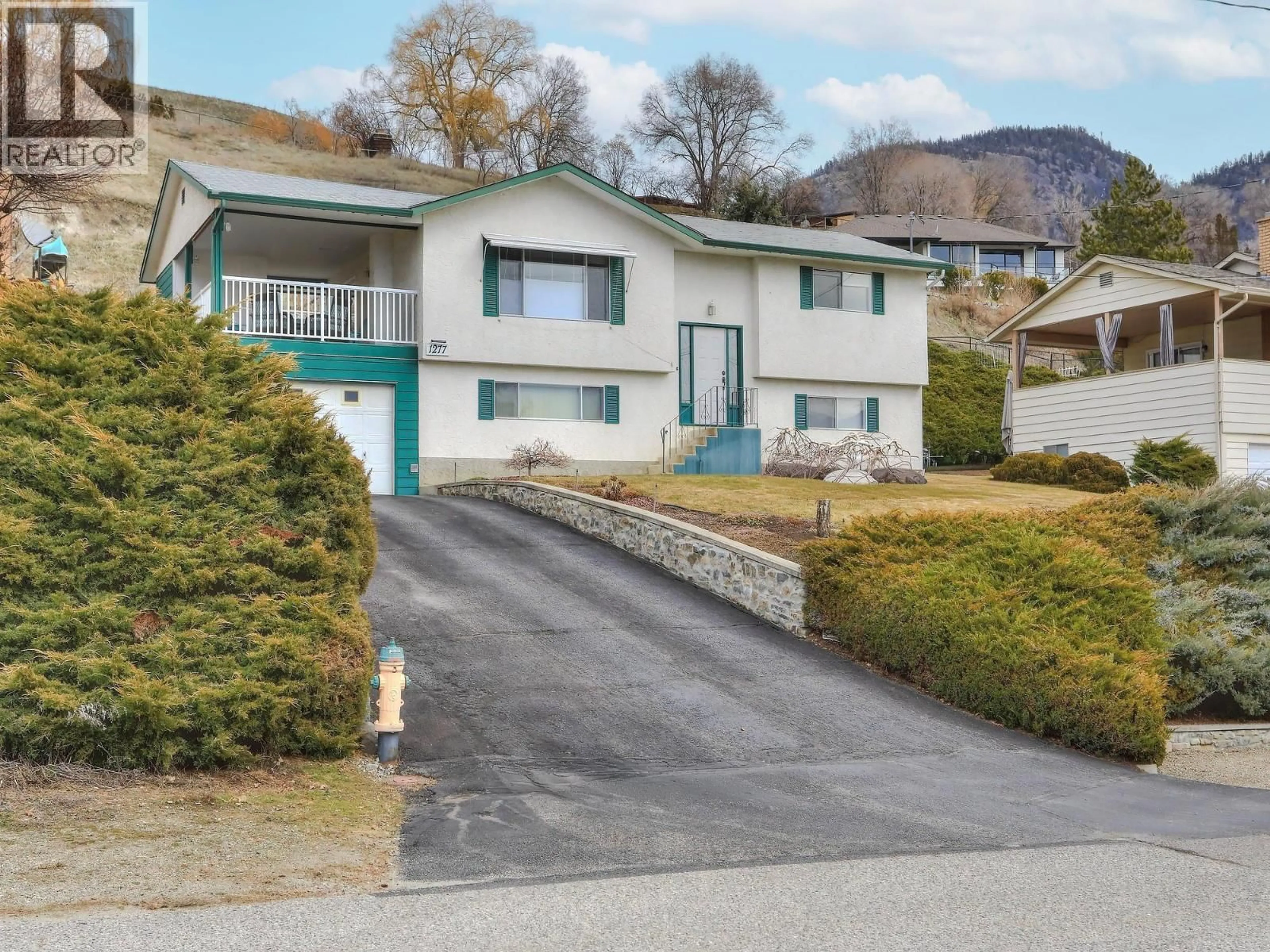 A pic from outside/outdoor area/front of a property/back of a property/a pic from drone, street for 1277 BEGLEY ROAD, Kelowna British Columbia V1P1K8