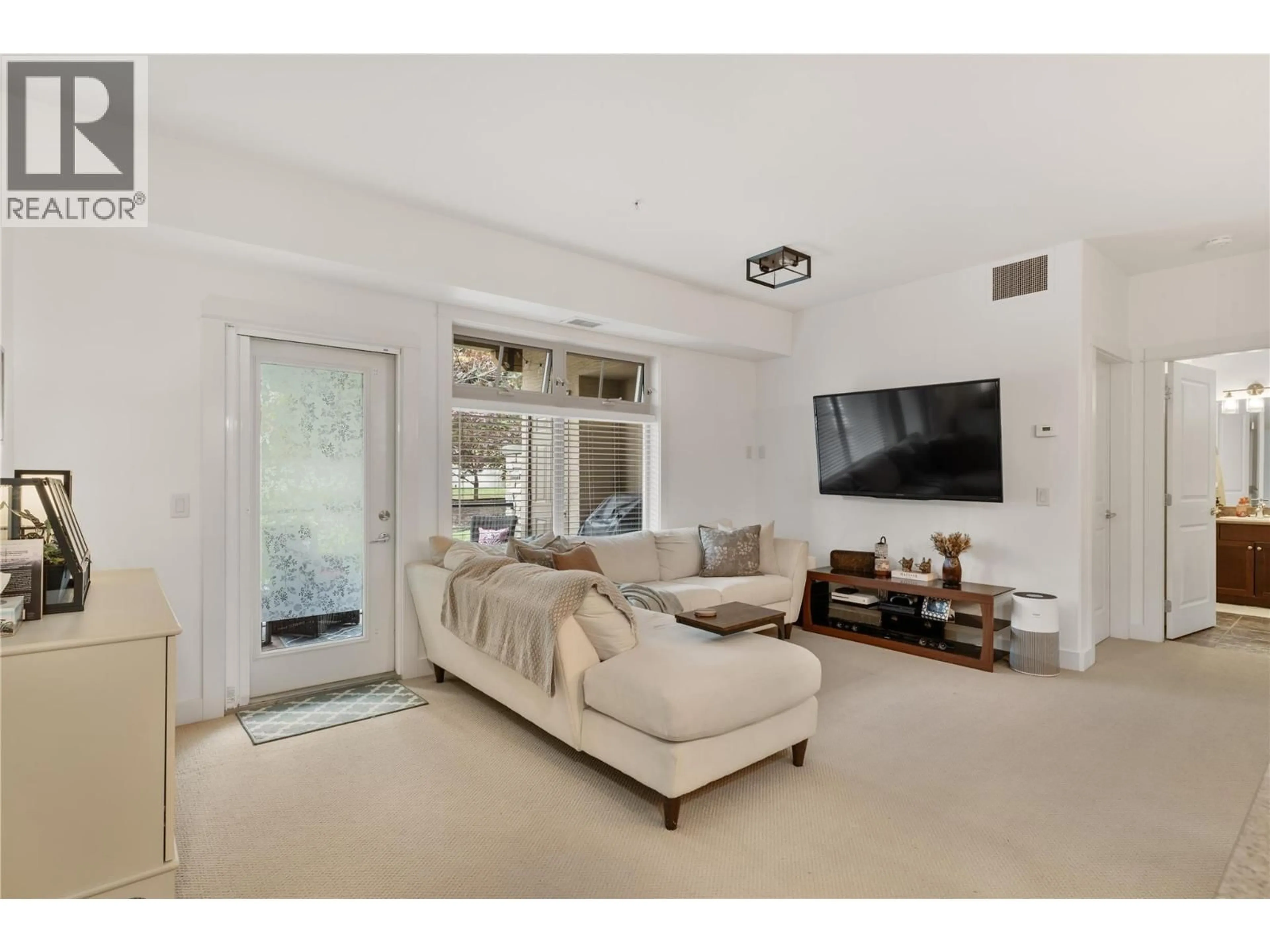 Living room with furniture, unknown for 114 - 2611 STILLWATER WAY, Lake Country British Columbia V4V2R3
