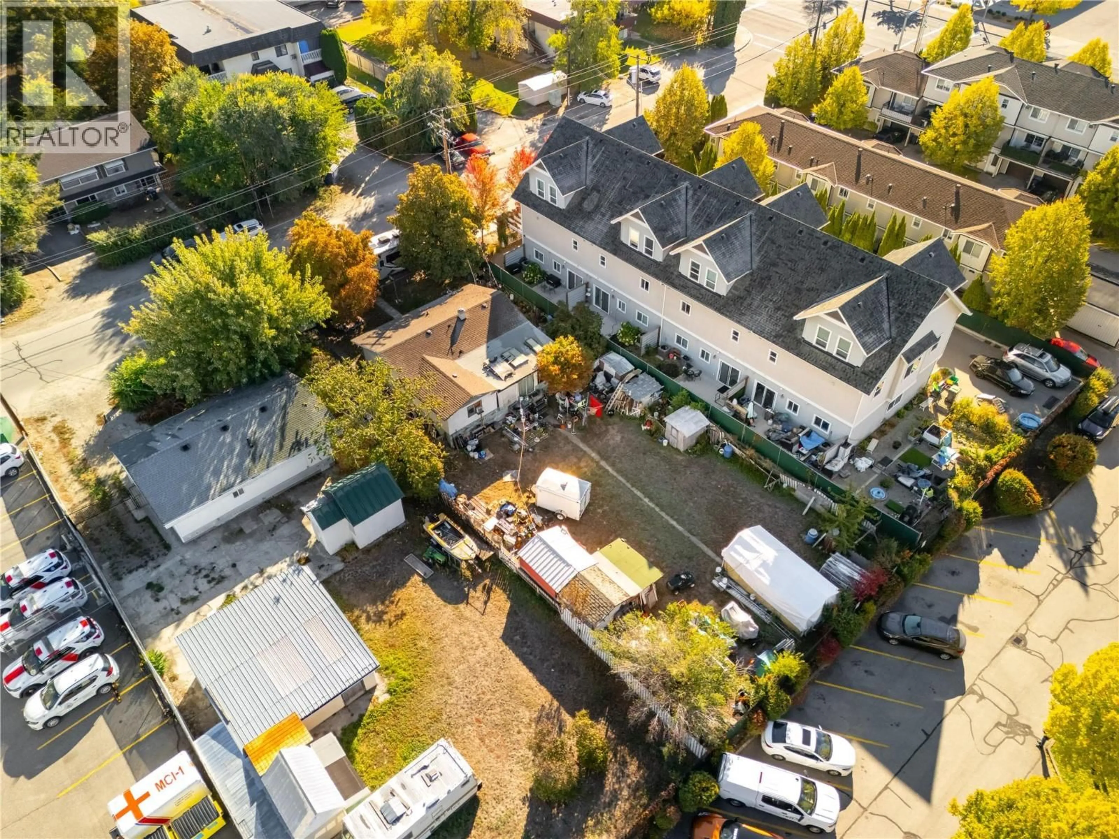 A pic from outside/outdoor area/front of a property/back of a property/a pic from drone, street for 150 MILLS ROAD, Kelowna British Columbia V1X4G7
